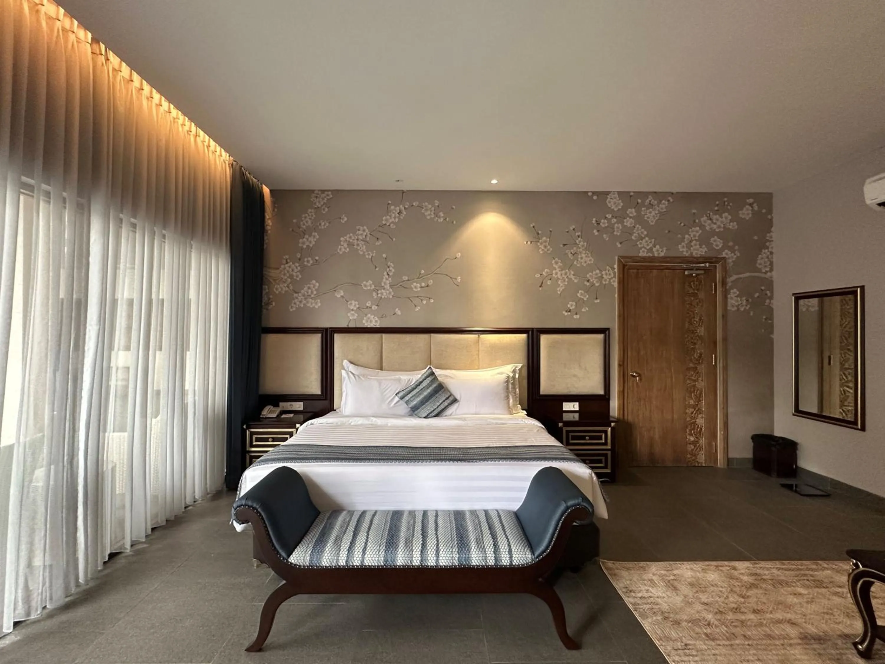 Bed in Tabebuya Resto & Resort