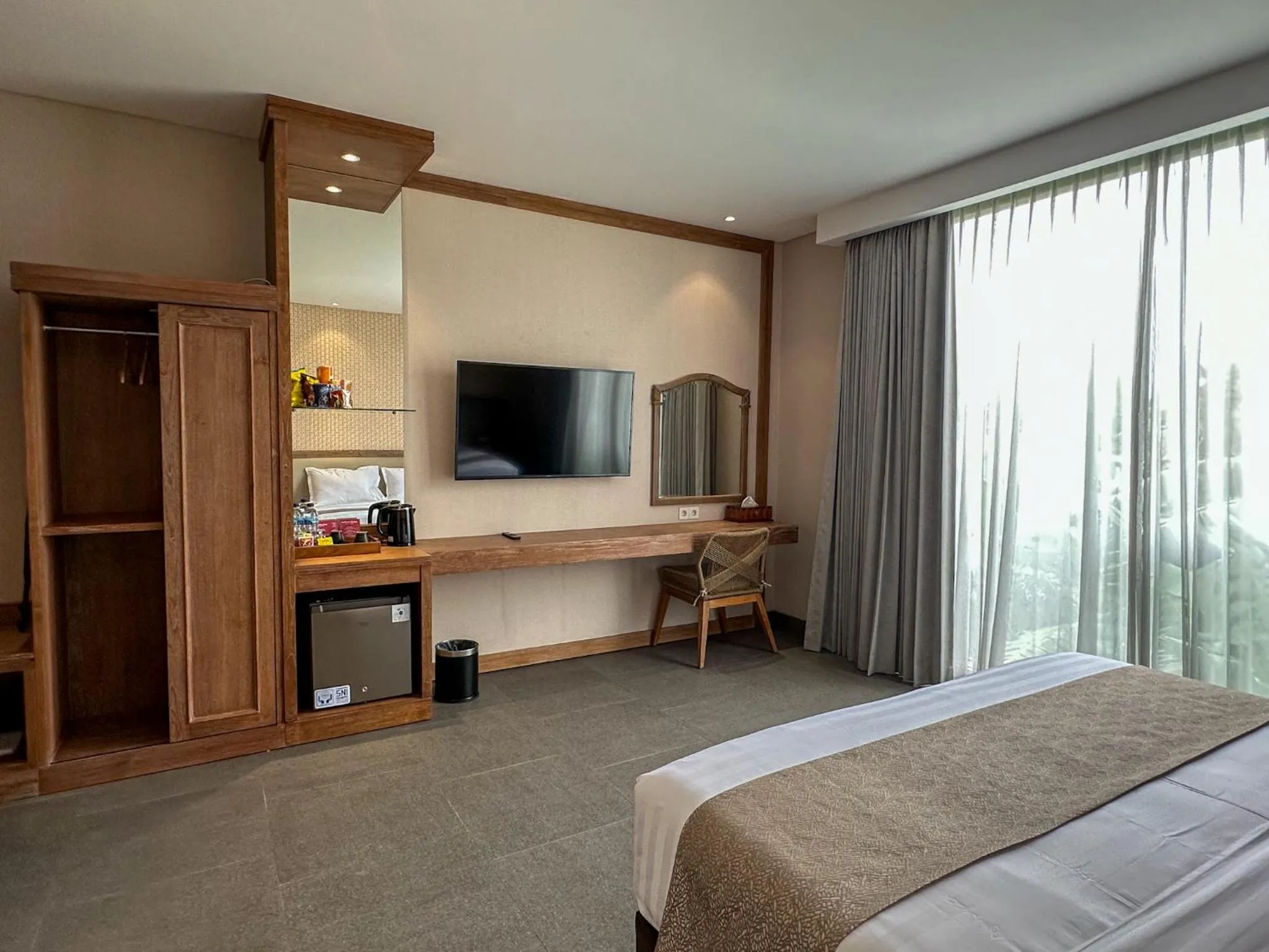 Bed in Tabebuya Resto & Resort