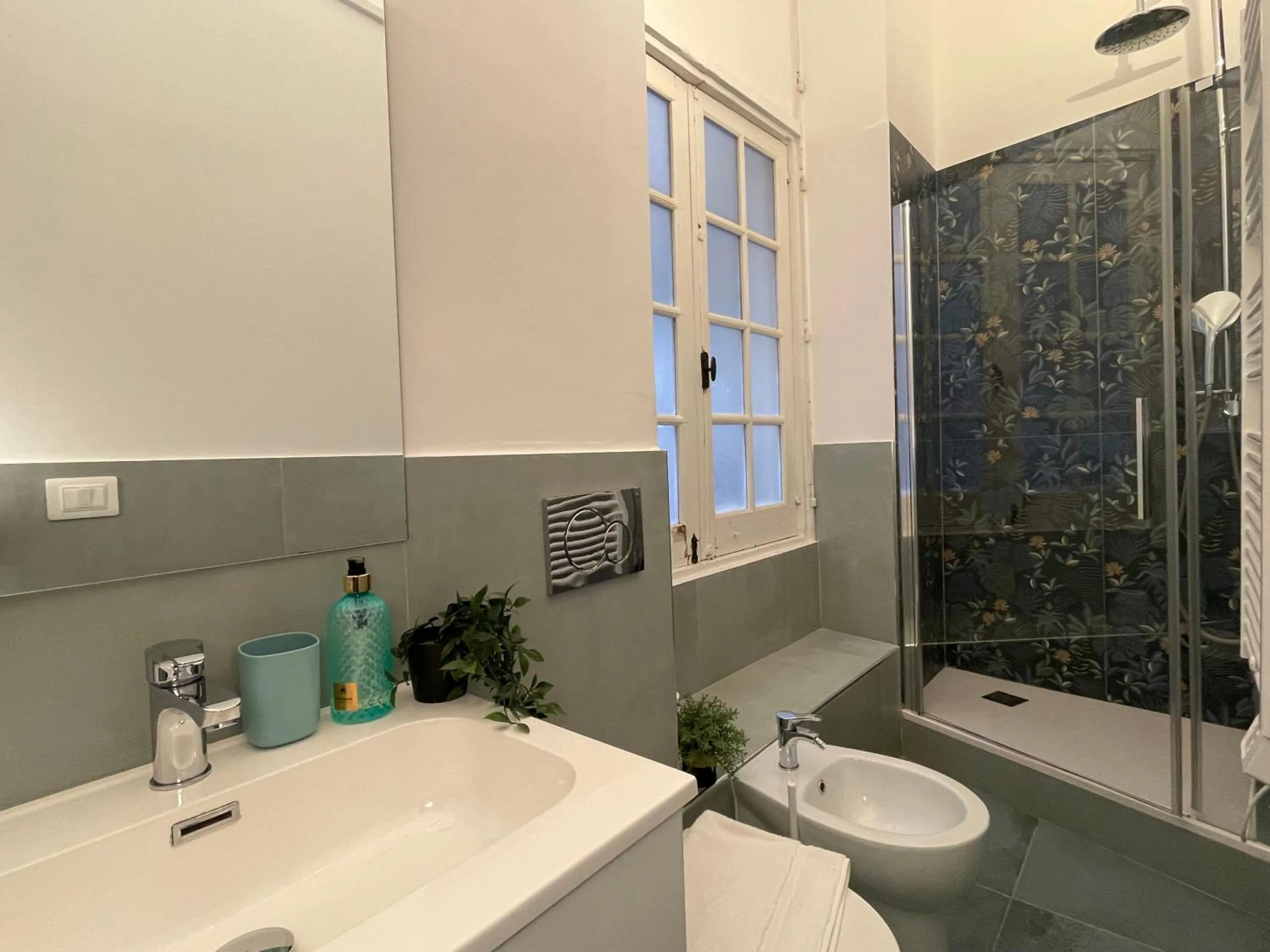 Shower in Happy Family Apartments Sauli