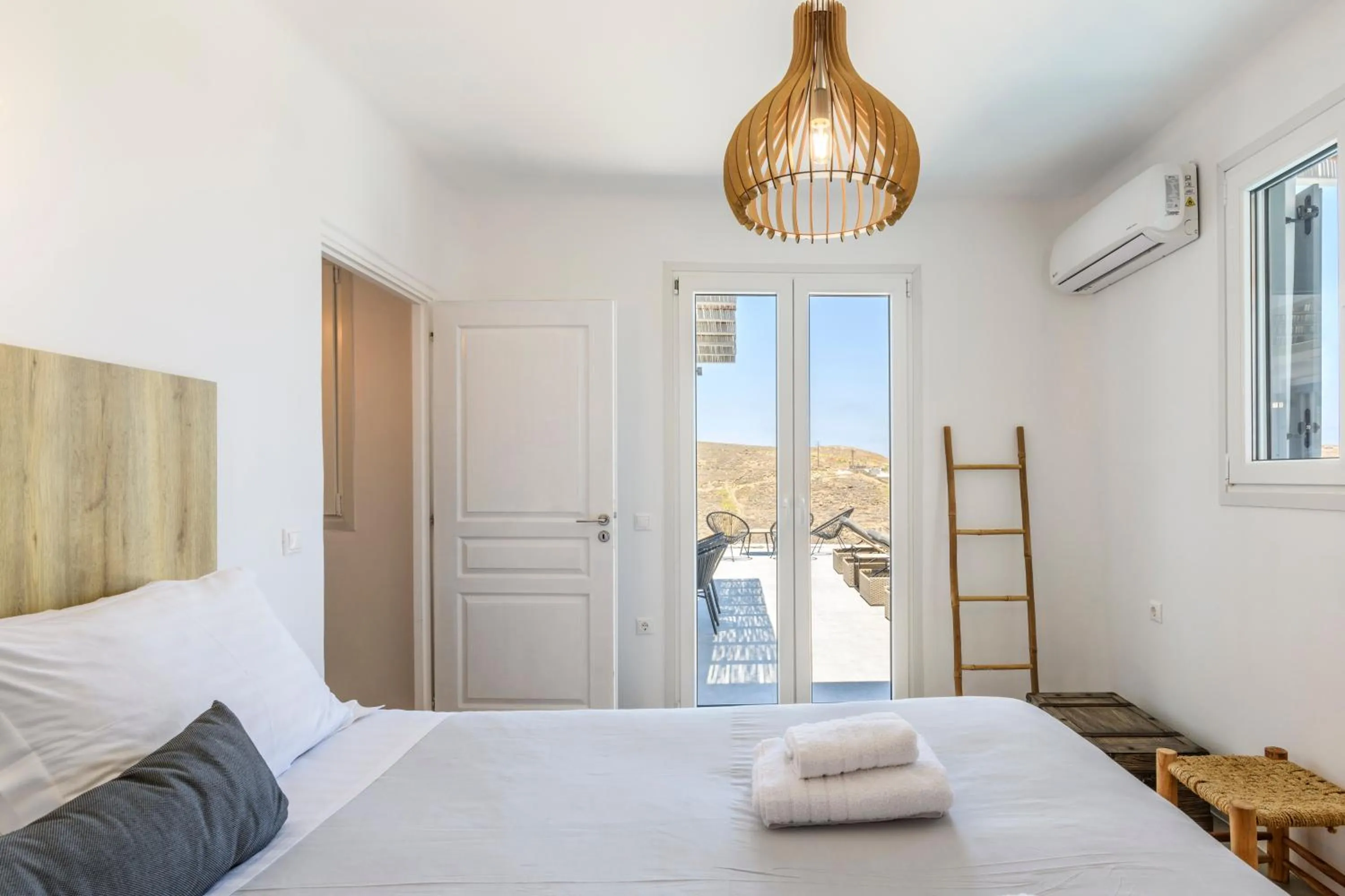 Bed in Mykonos Residence Villas & Suites Merchia beach