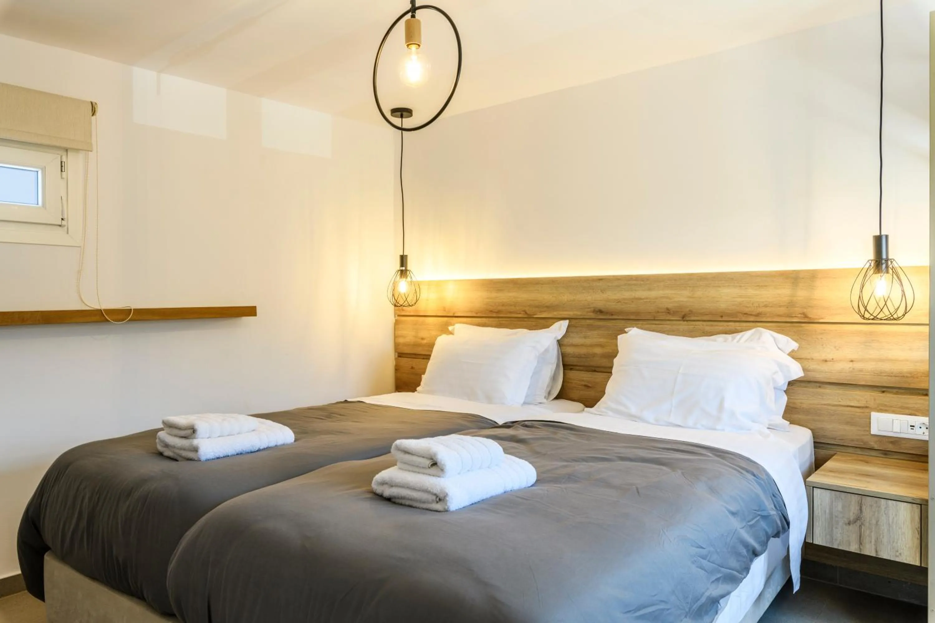Bed in Mykonos Residence Villas & Suites Merchia beach