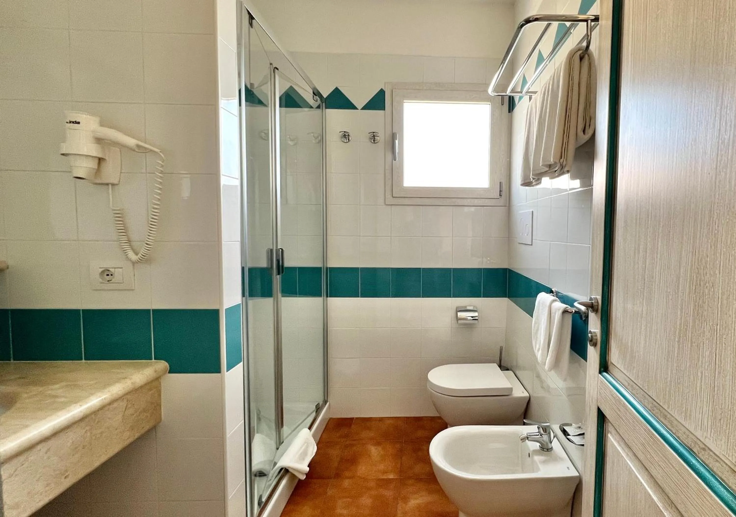 Bathroom in Residence in Orosei apartments with air conditioning and private outdoor area