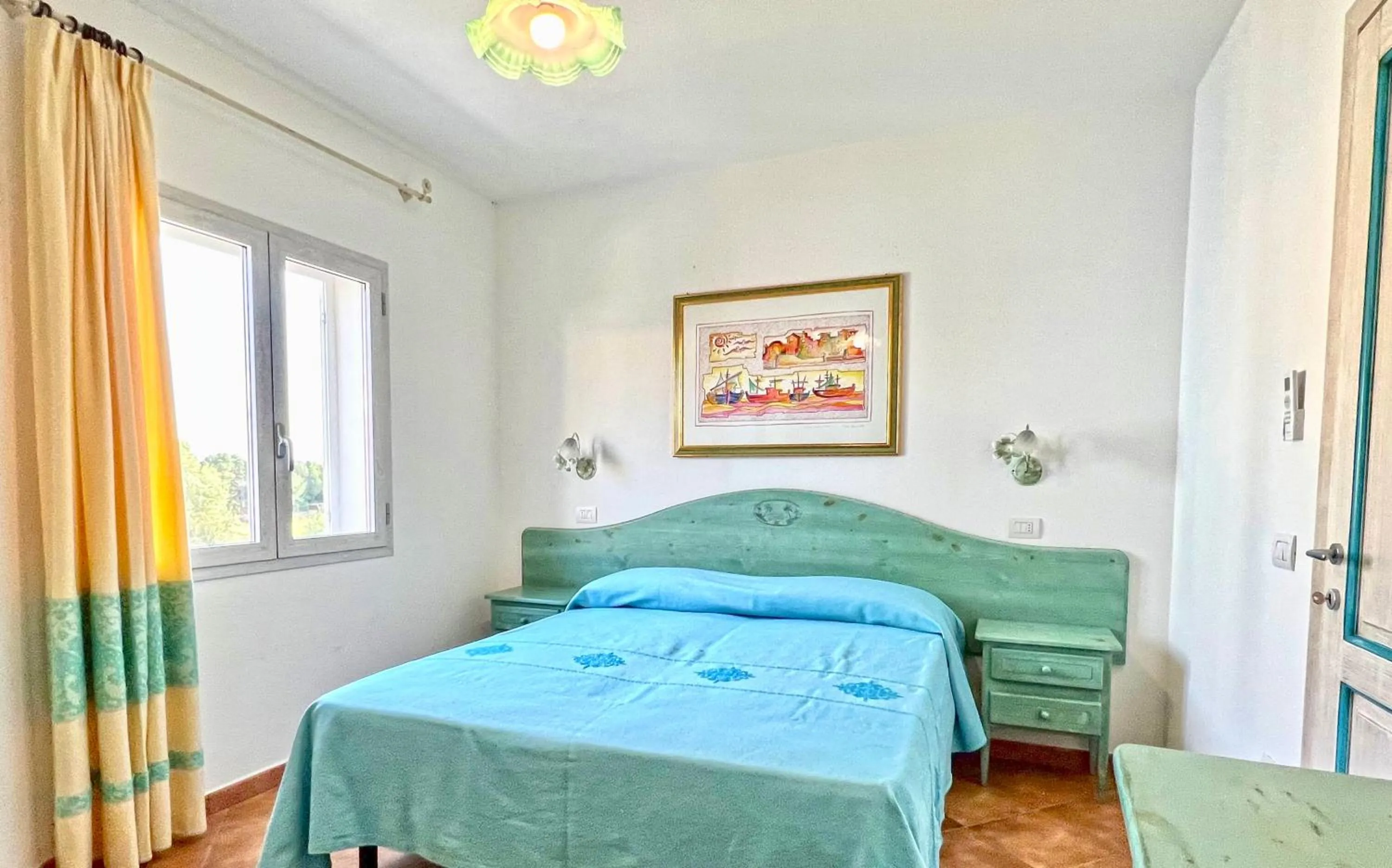 Bedroom, Bed in Residence in Orosei apartments with air conditioning and private outdoor area
