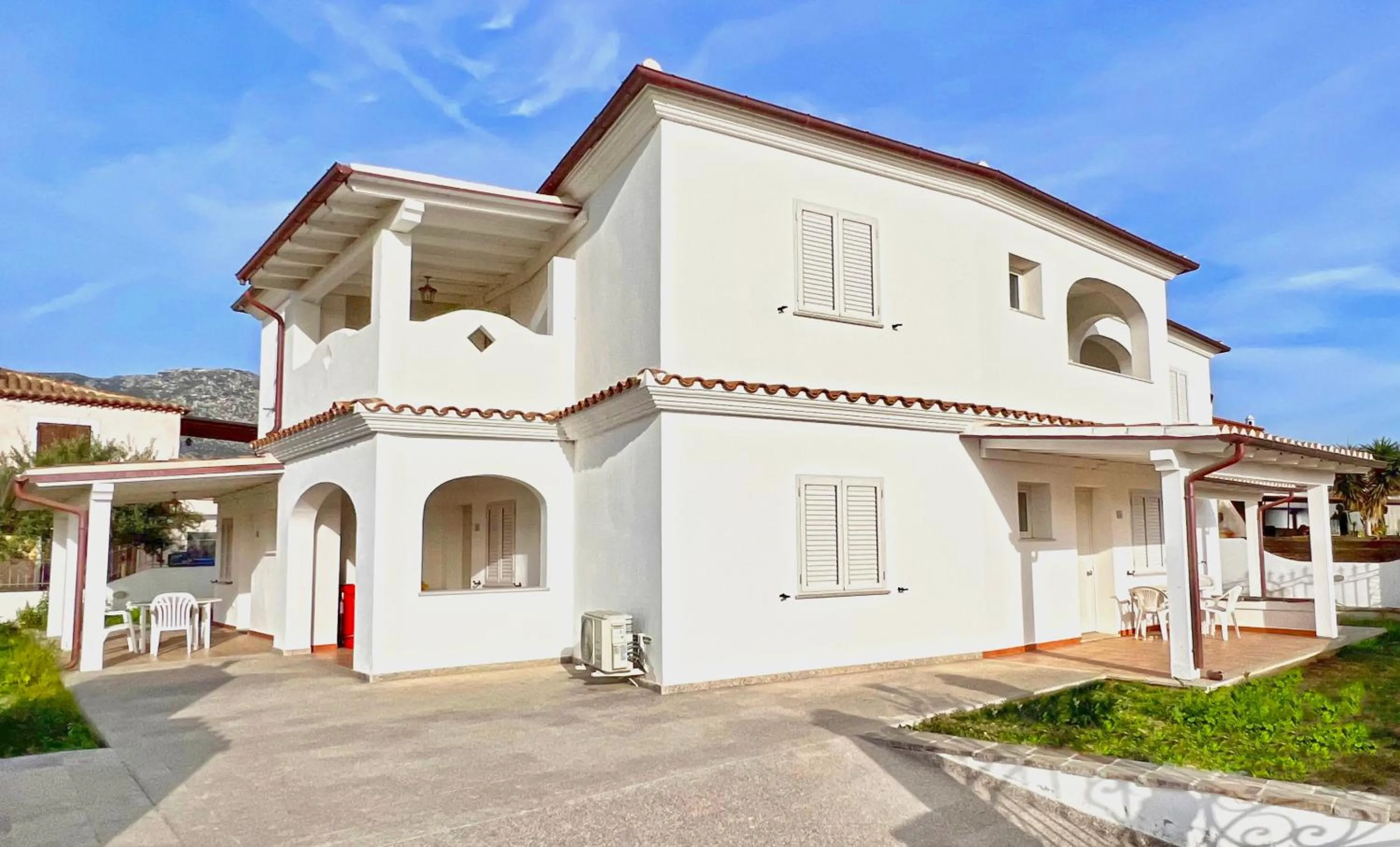Property building in Residence in Orosei apartments with air conditioning and private outdoor area