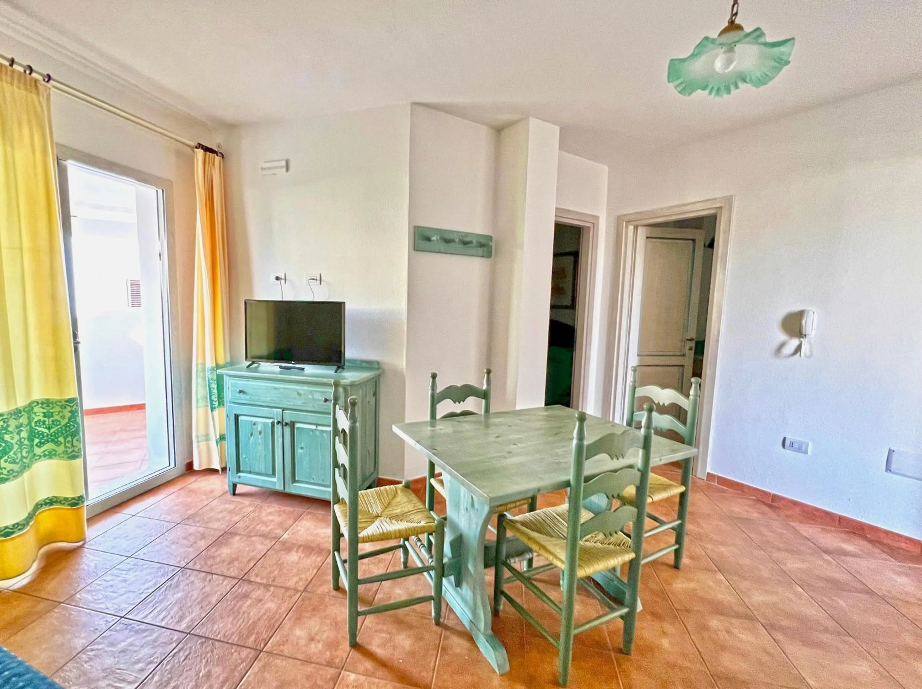 Living room in Residence in Orosei apartments with air conditioning and private outdoor area