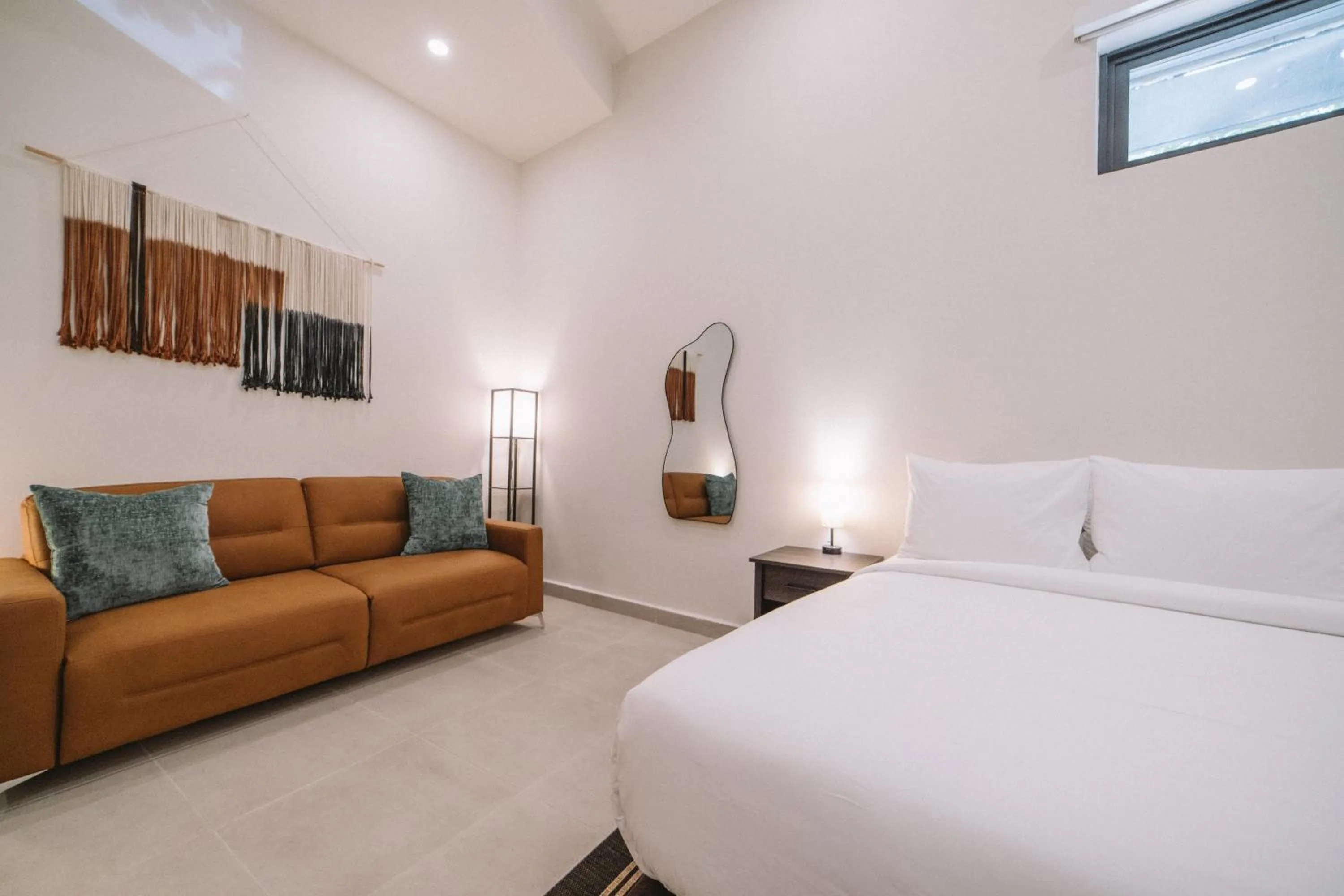 Bed in The Looking Glass Hotel