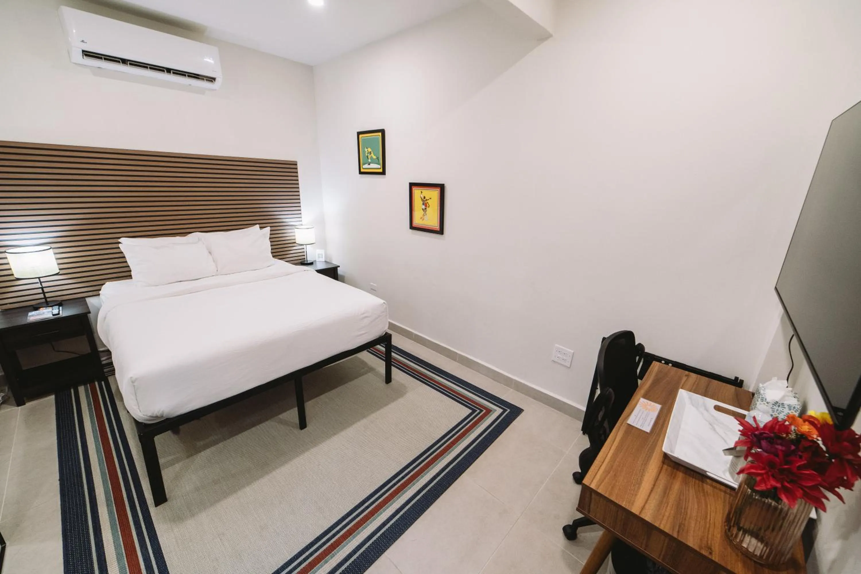 Bed in The Looking Glass Hotel