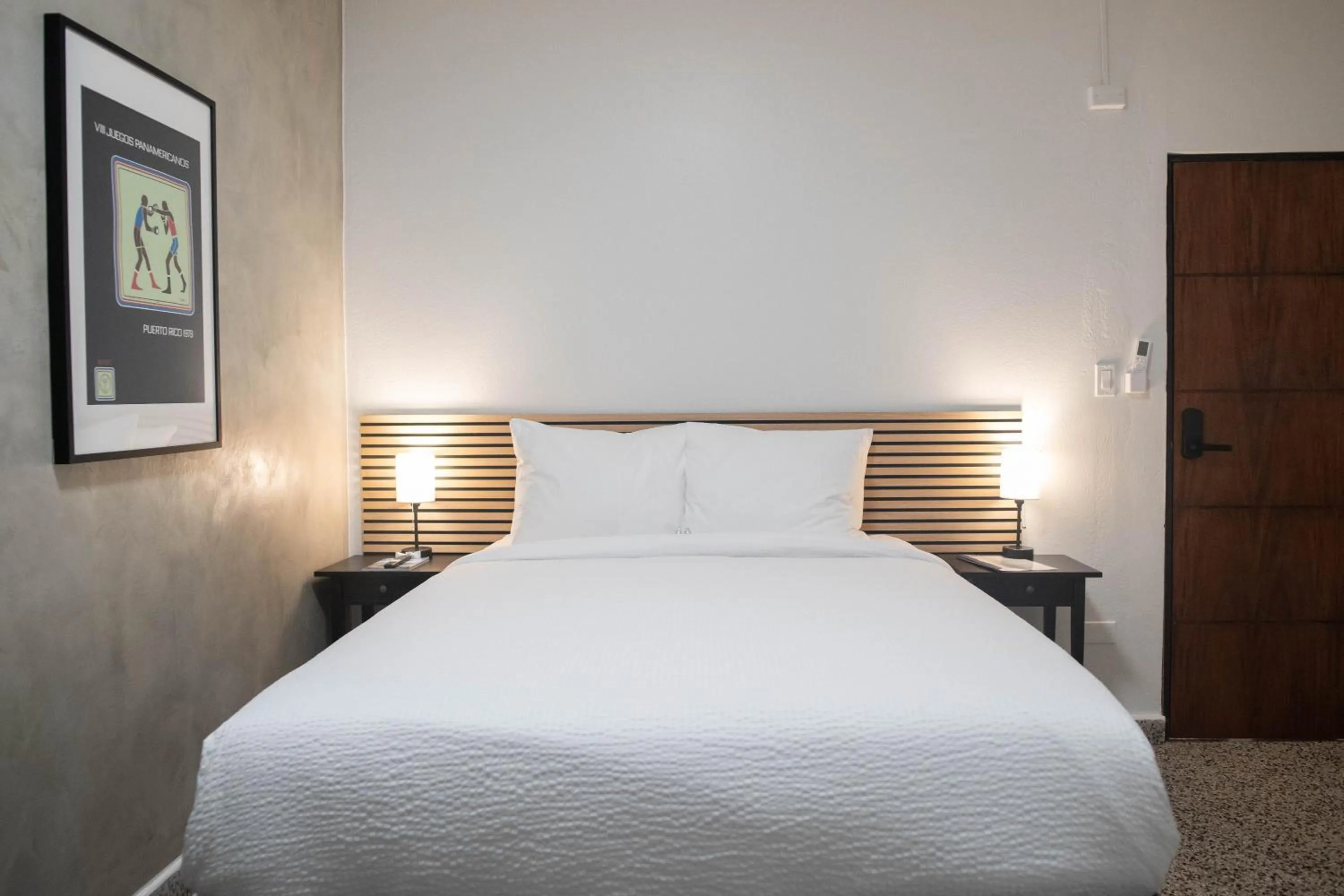 Bed in The Looking Glass Hotel