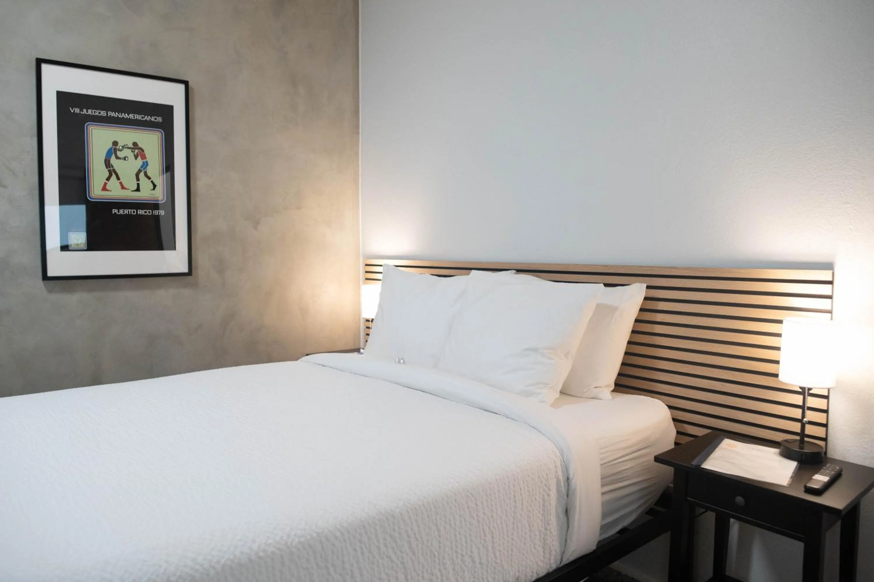 Bed in The Looking Glass Hotel