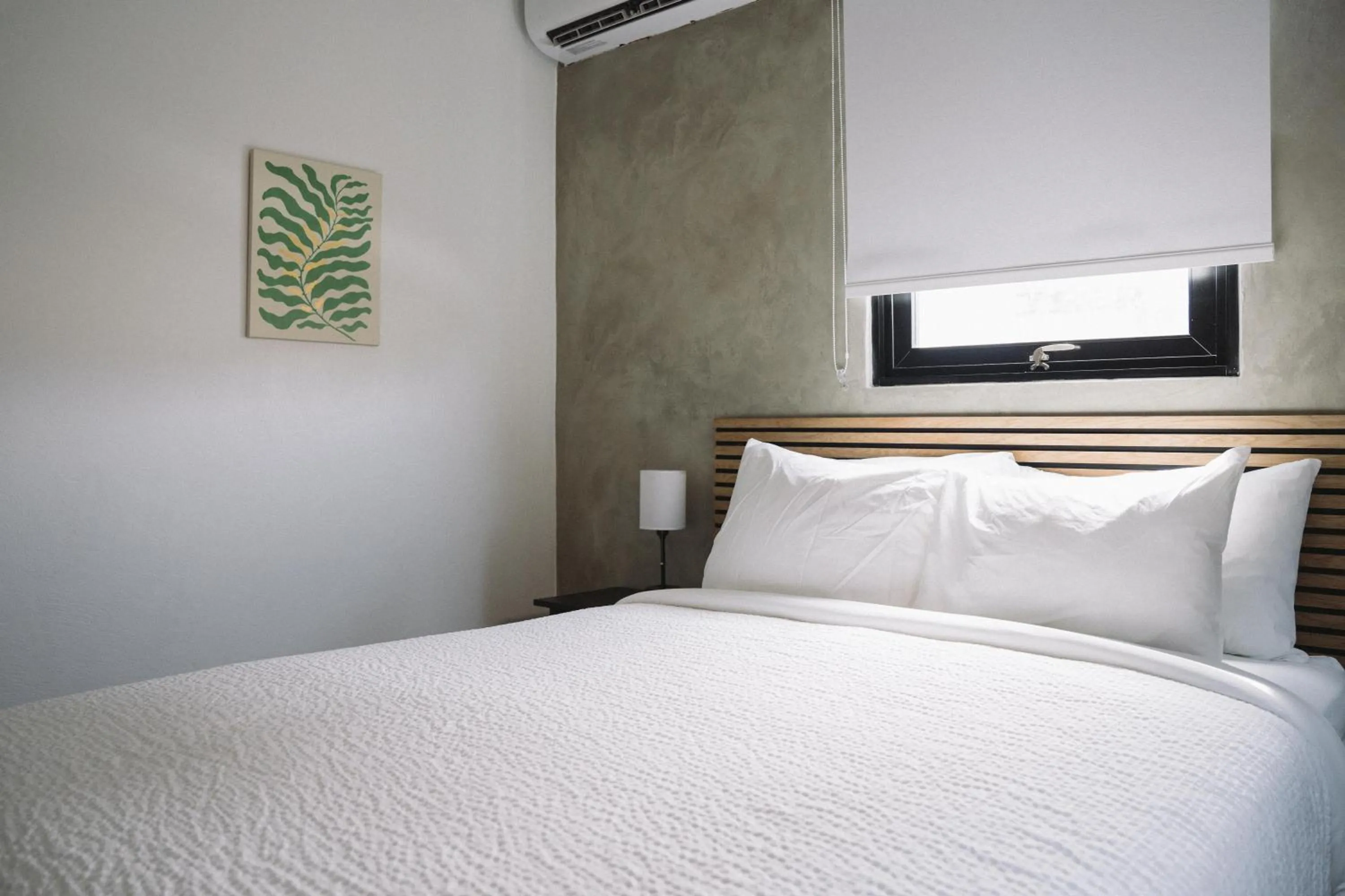 Bed in The Looking Glass Hotel