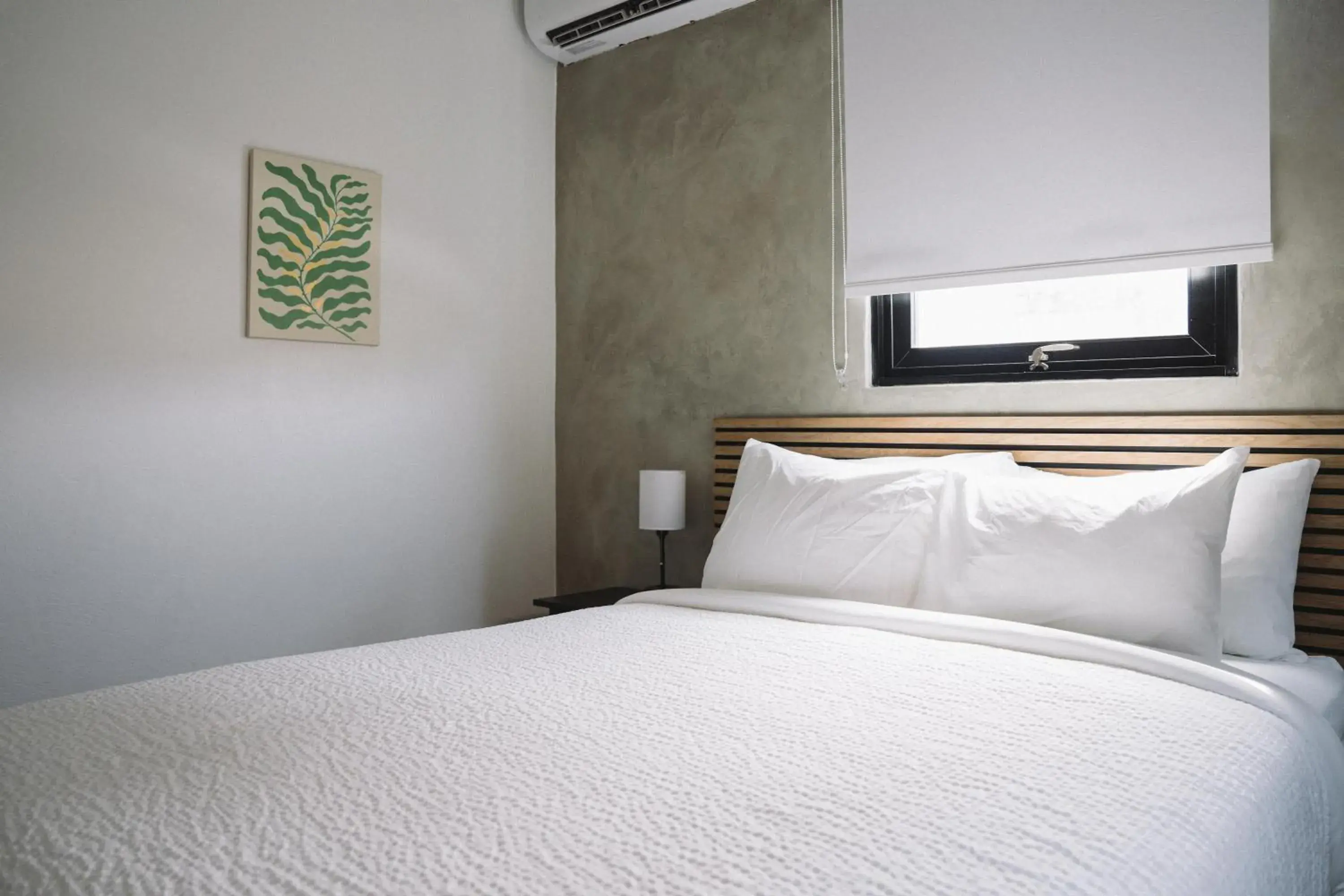 Bed in The Looking Glass Hotel Bed in The Looking Glass Hotel