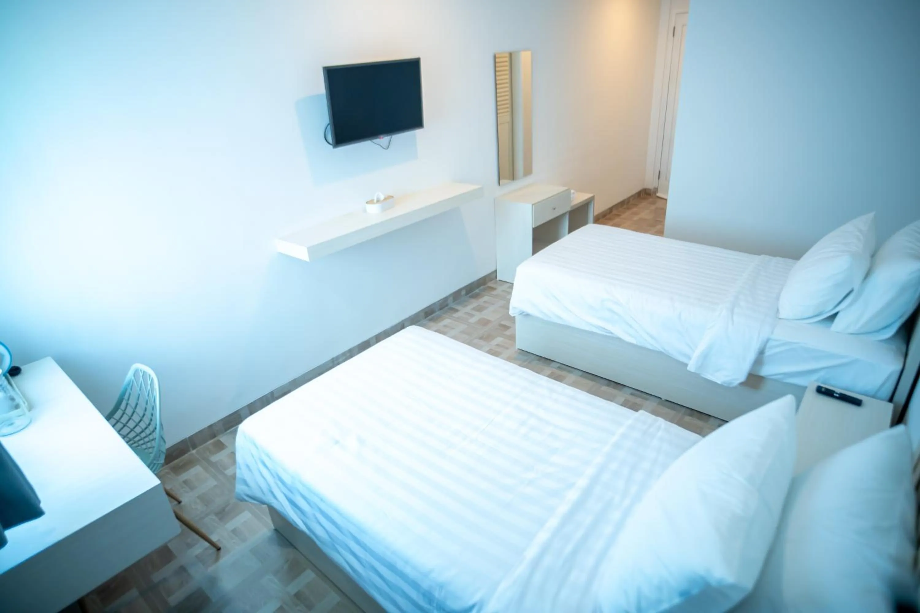 Bed in Elephant Inn and Suite by Sajiwa