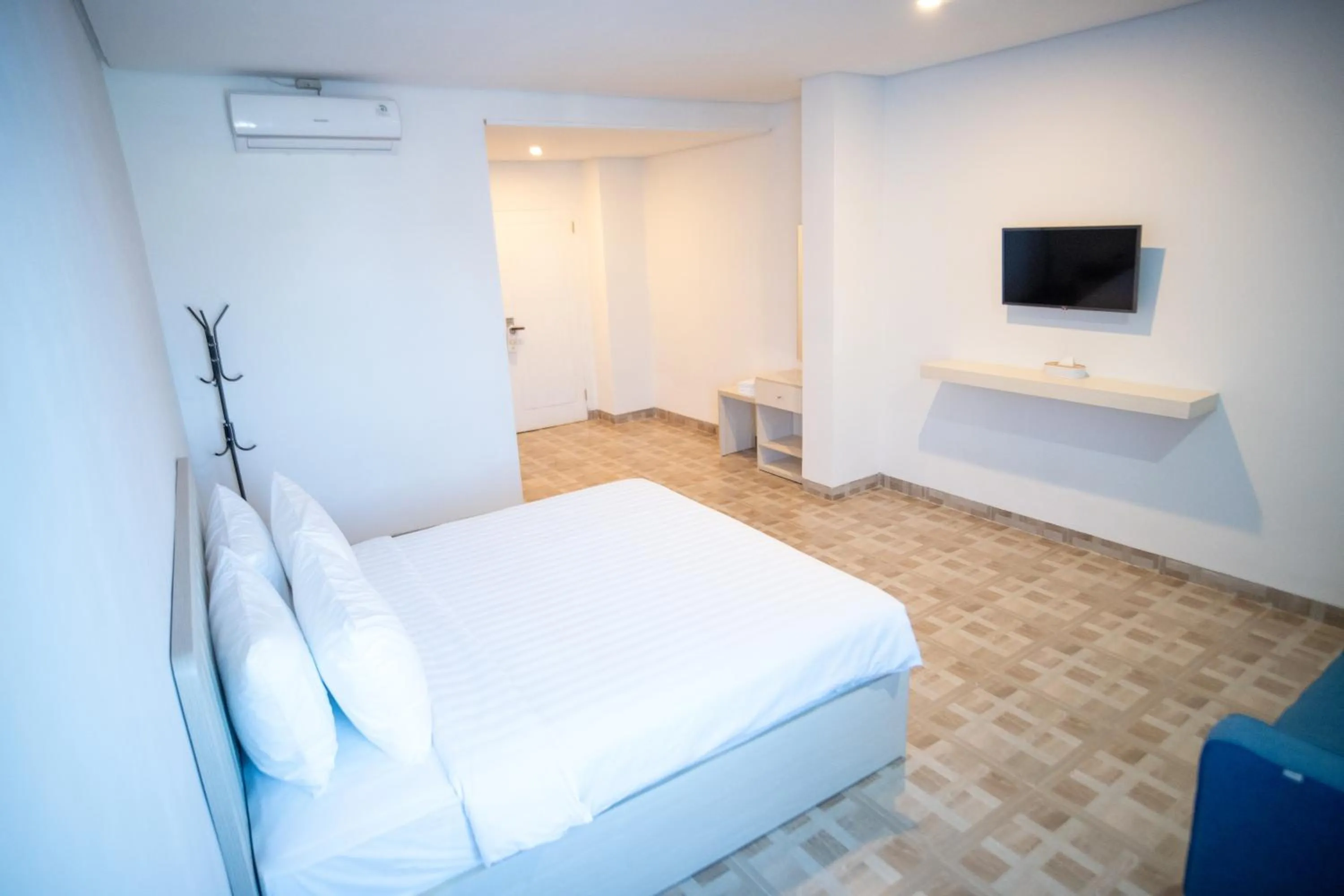 Bed in Elephant Inn and Suite by Sajiwa