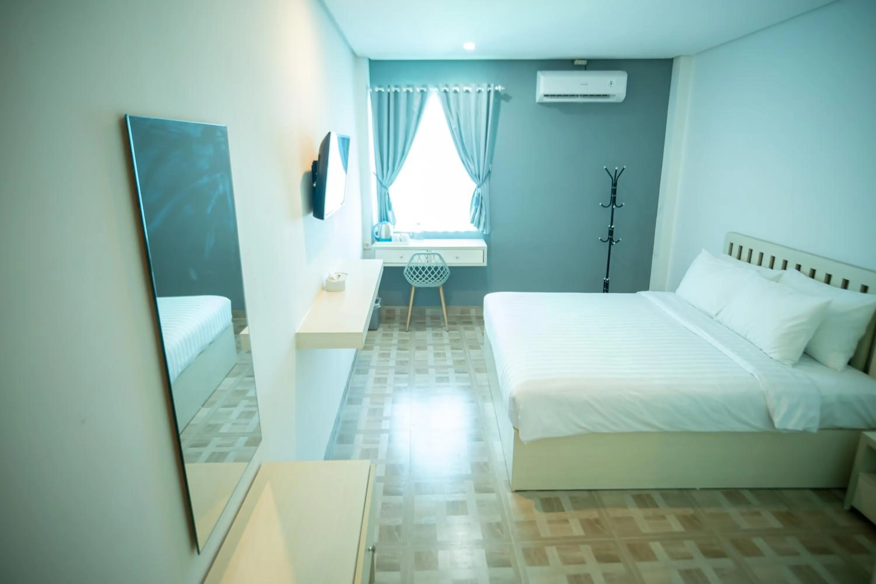 Bed in Elephant Inn and Suite by Sajiwa