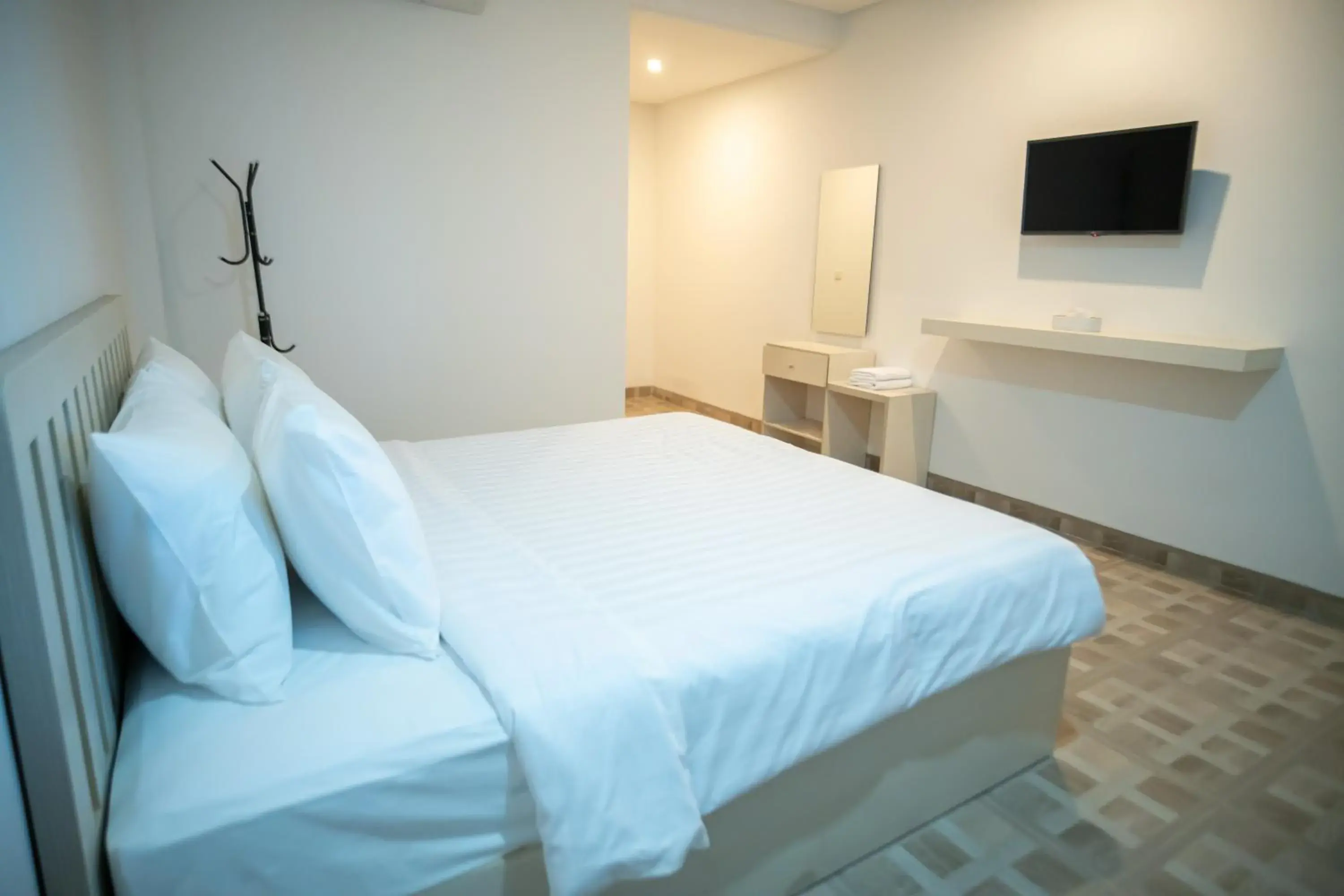 Bed in Elephant Inn and Suite by Sajiwa Bed in Elephant Inn and Suite by Sajiwa