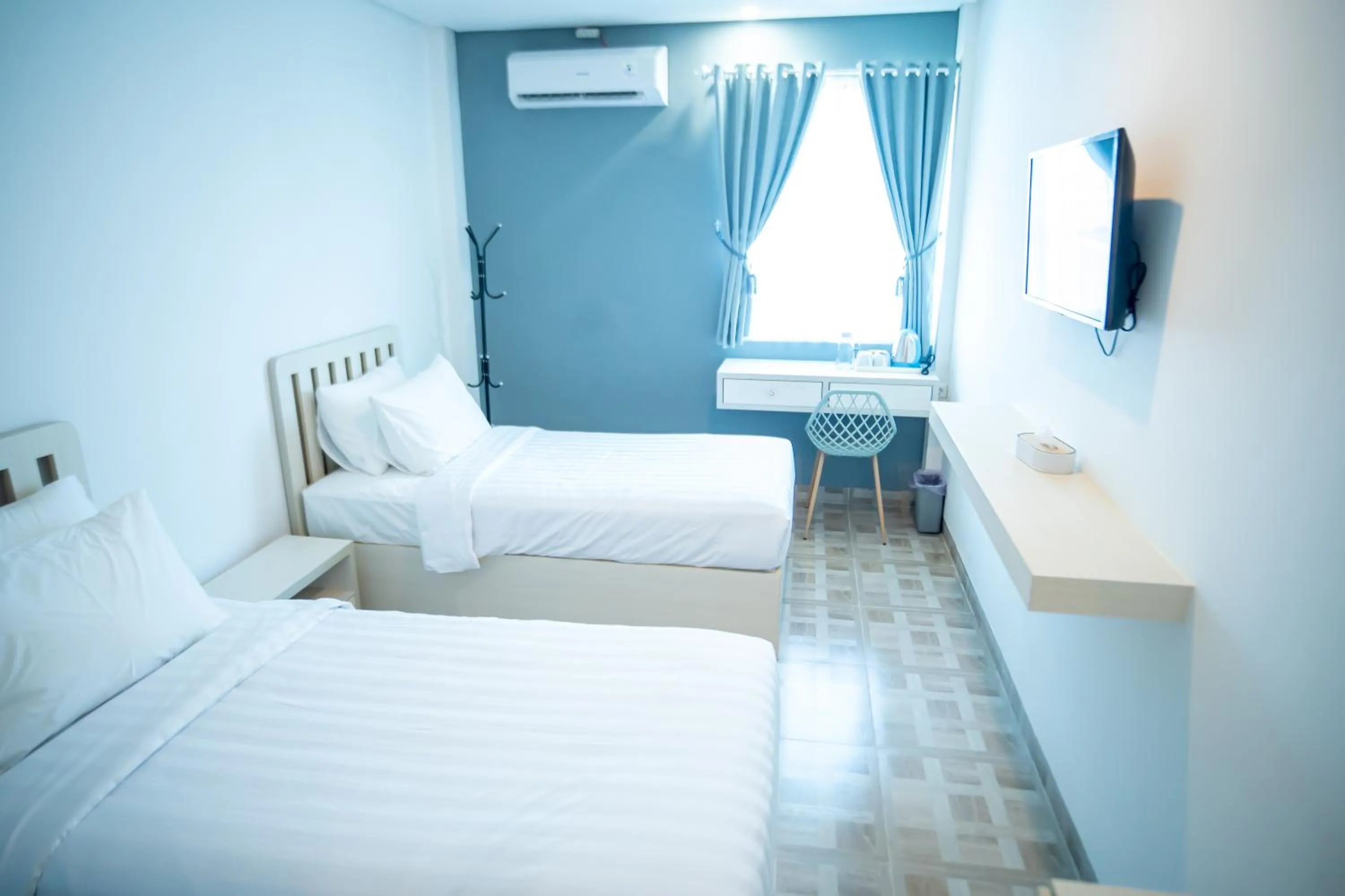 Bed in Elephant Inn and Suite by Sajiwa