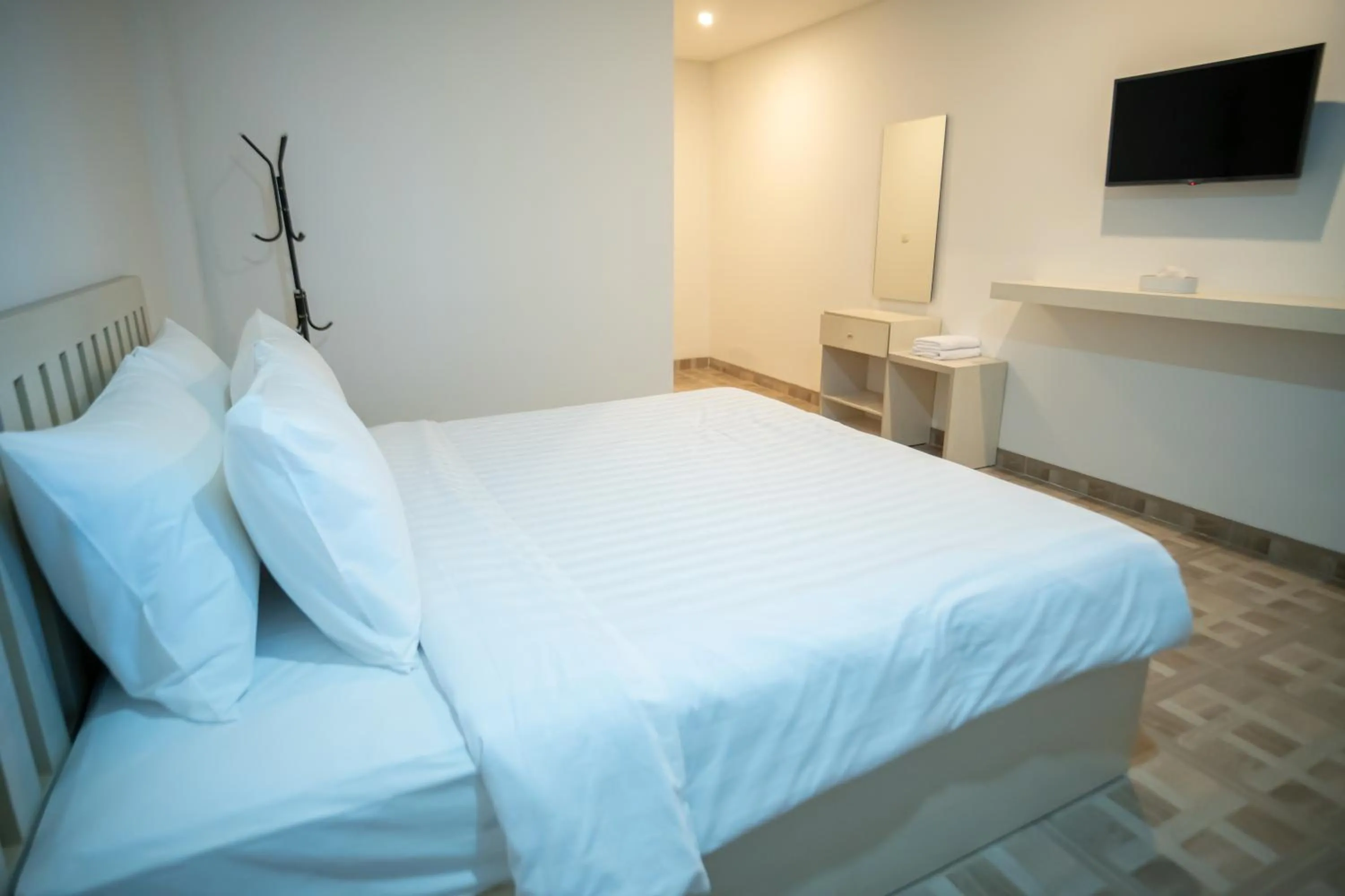 Bed in Elephant Inn and Suite by Sajiwa