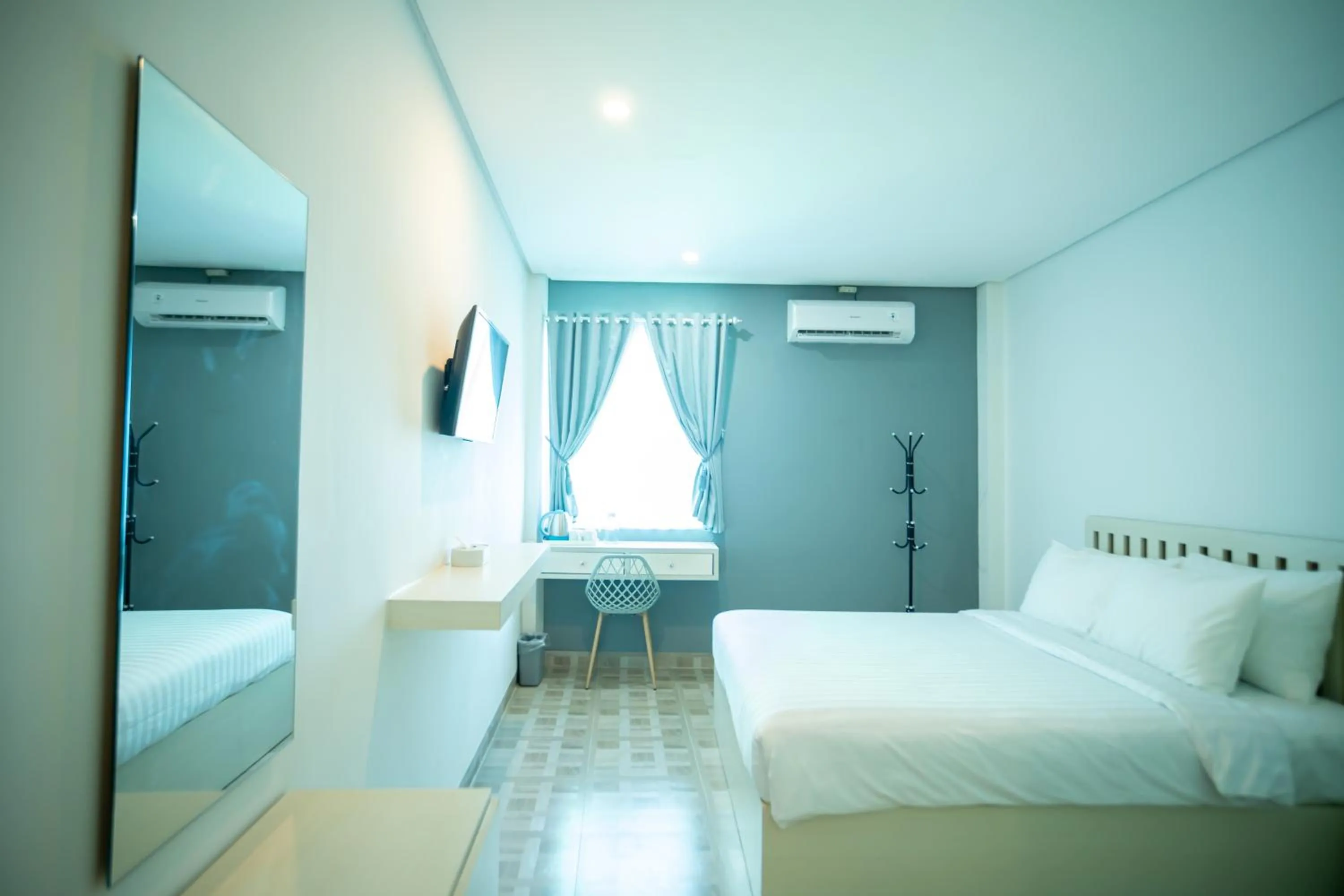 Bed in Elephant Inn and Suite by Sajiwa