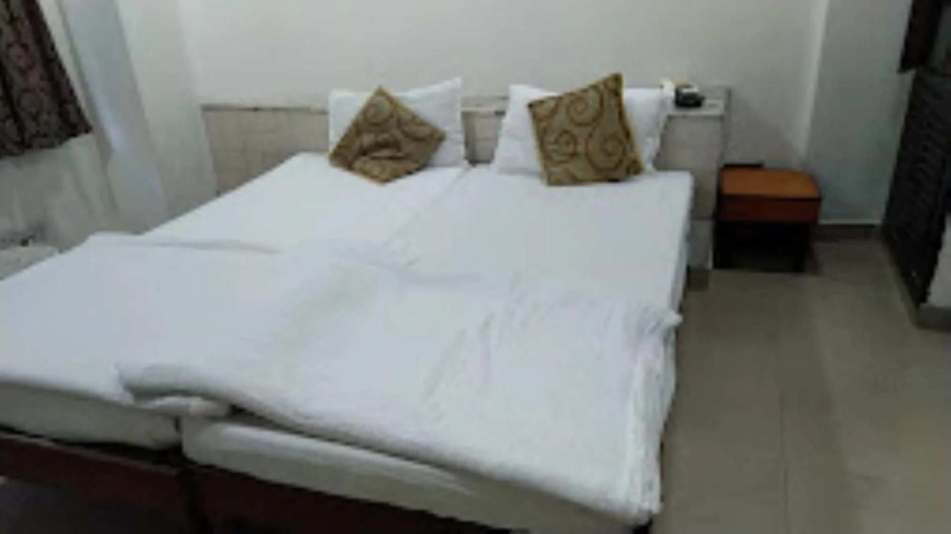 Bed in Hotel Pathik Bhopal , Madhya Pradesh