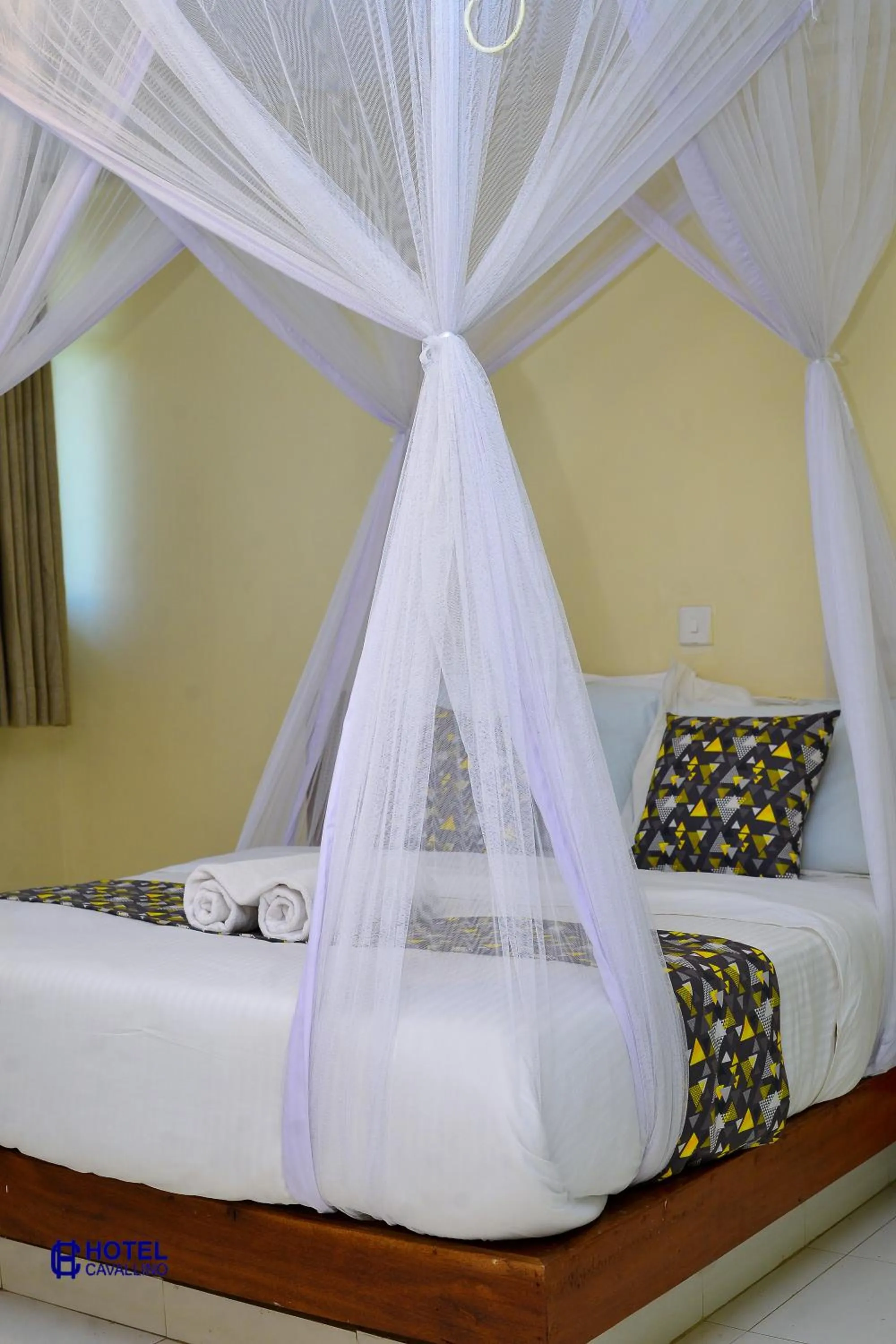 Bed in Hotel Cavallino