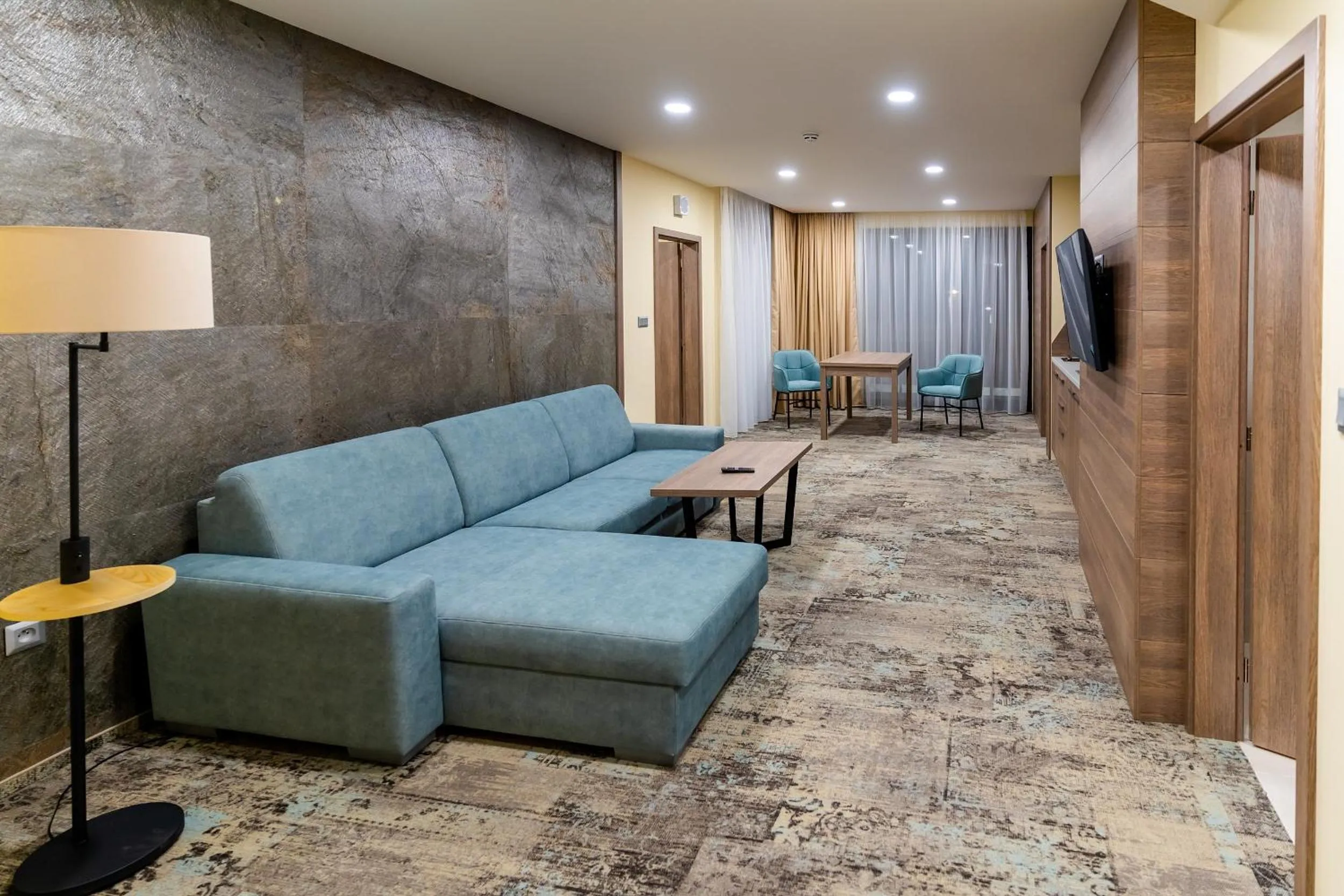 Communal lounge/ TV room in Spa & Wellness Hotel Fitak****