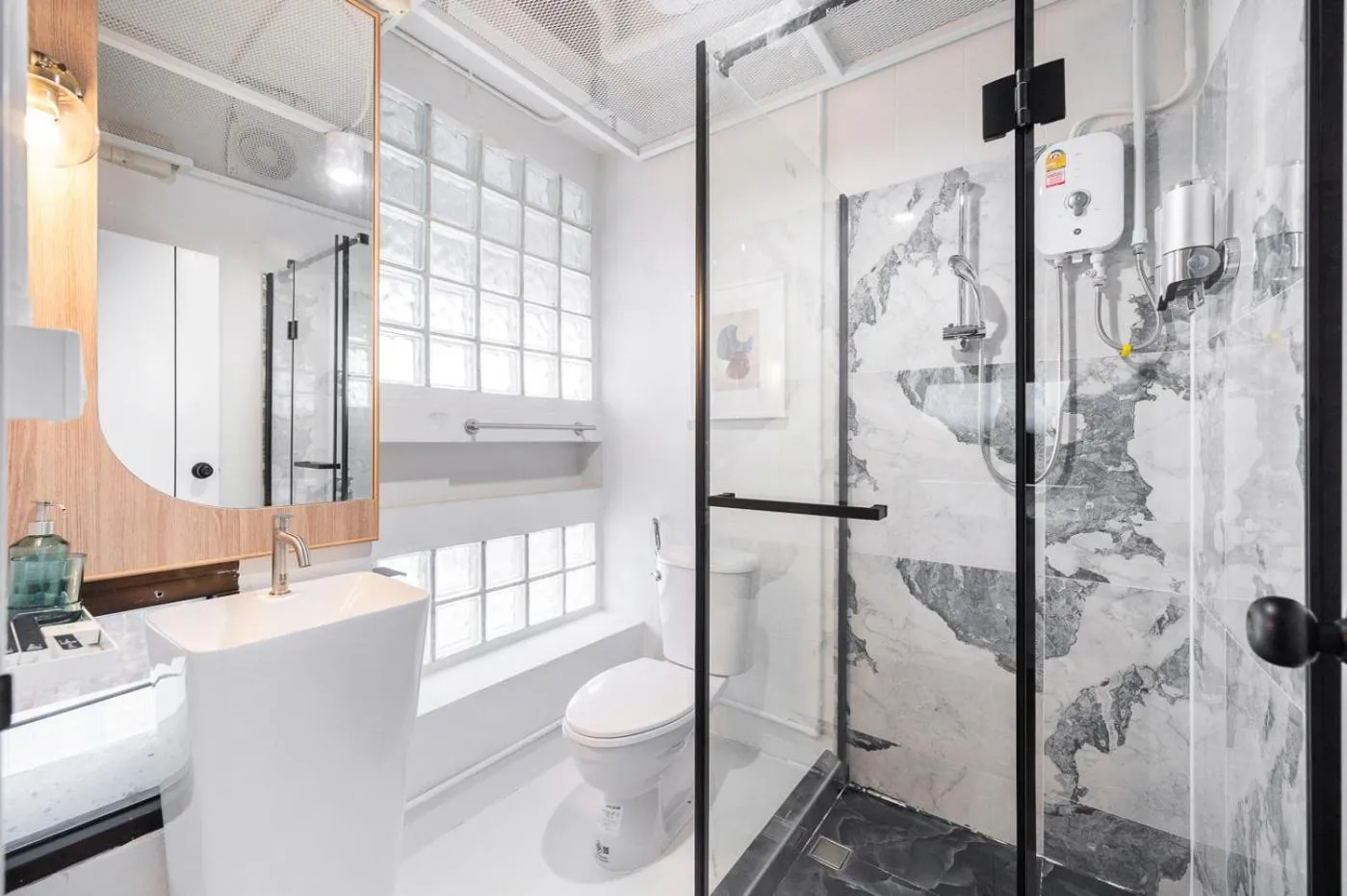 Shower in Unplugged at Bangrak Design Hostel