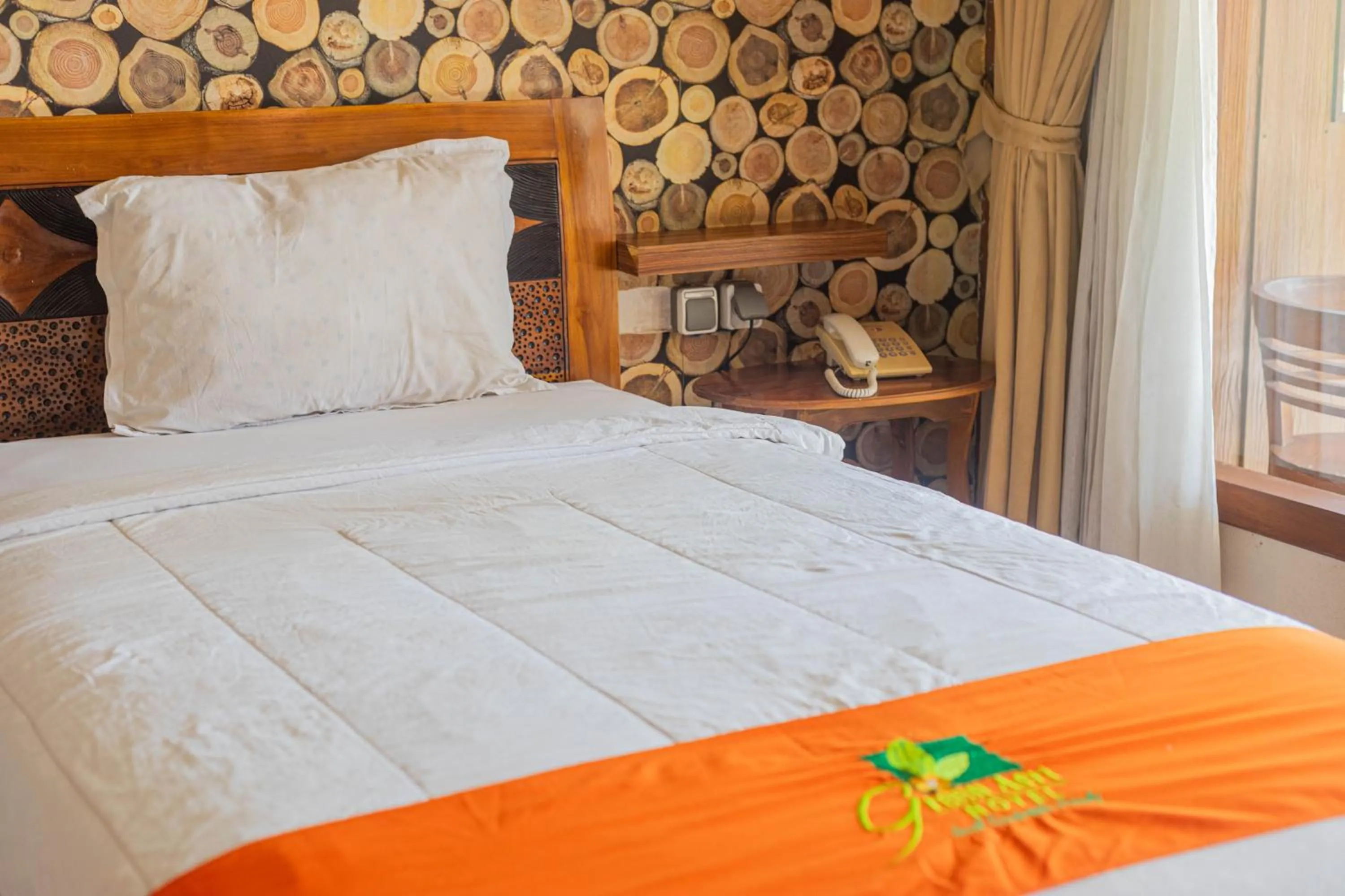 Bed in Green Asri Hotel