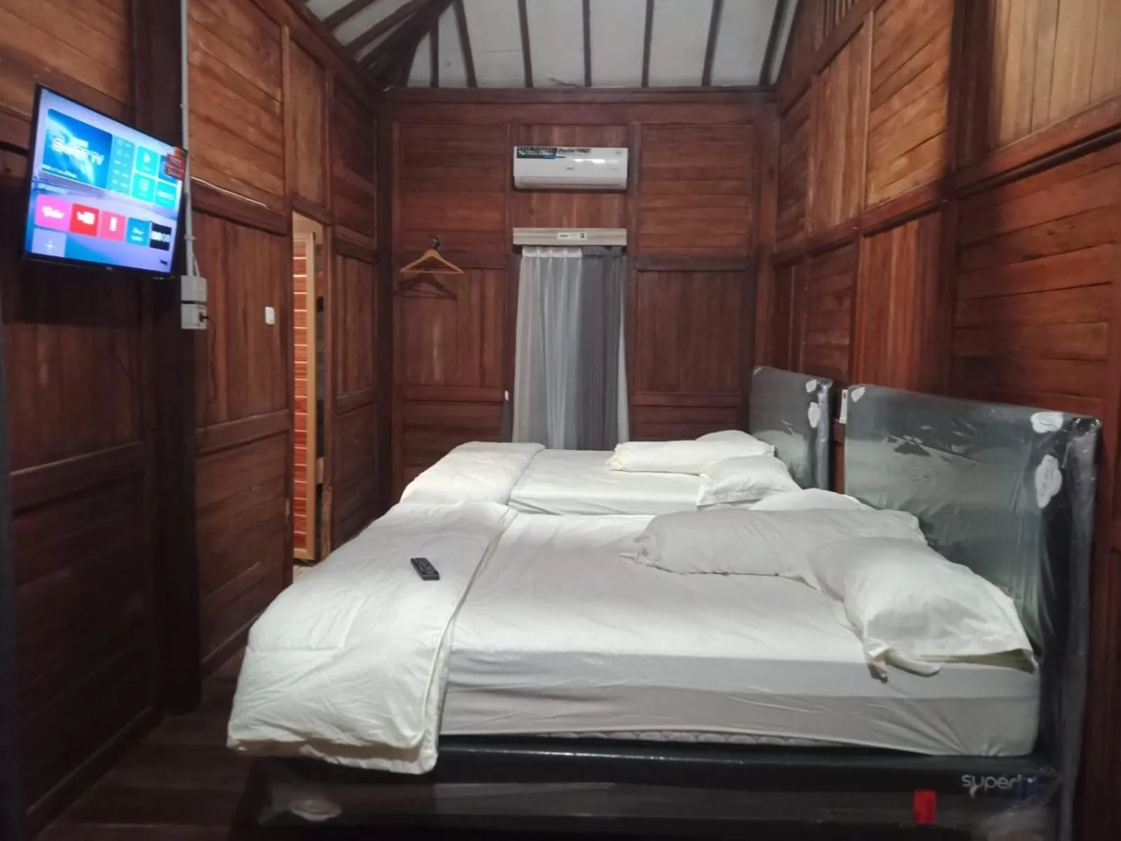 Bed in NK Villa Syariah And Cafe Prigen