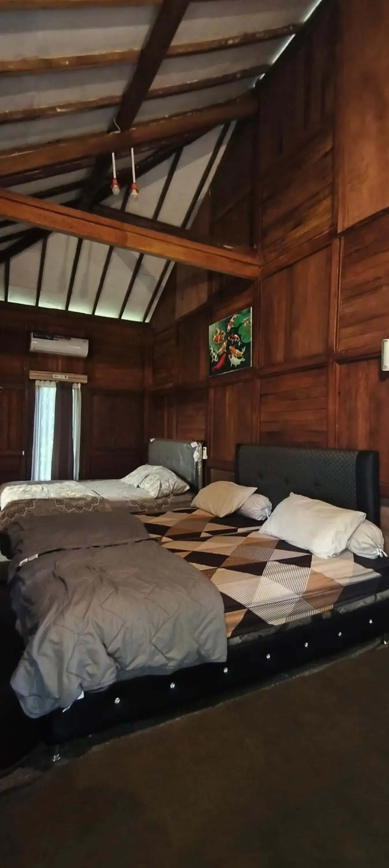 Bed in NK Villa Syariah And Cafe Prigen Bed in NK Villa Syariah And Cafe Prigen