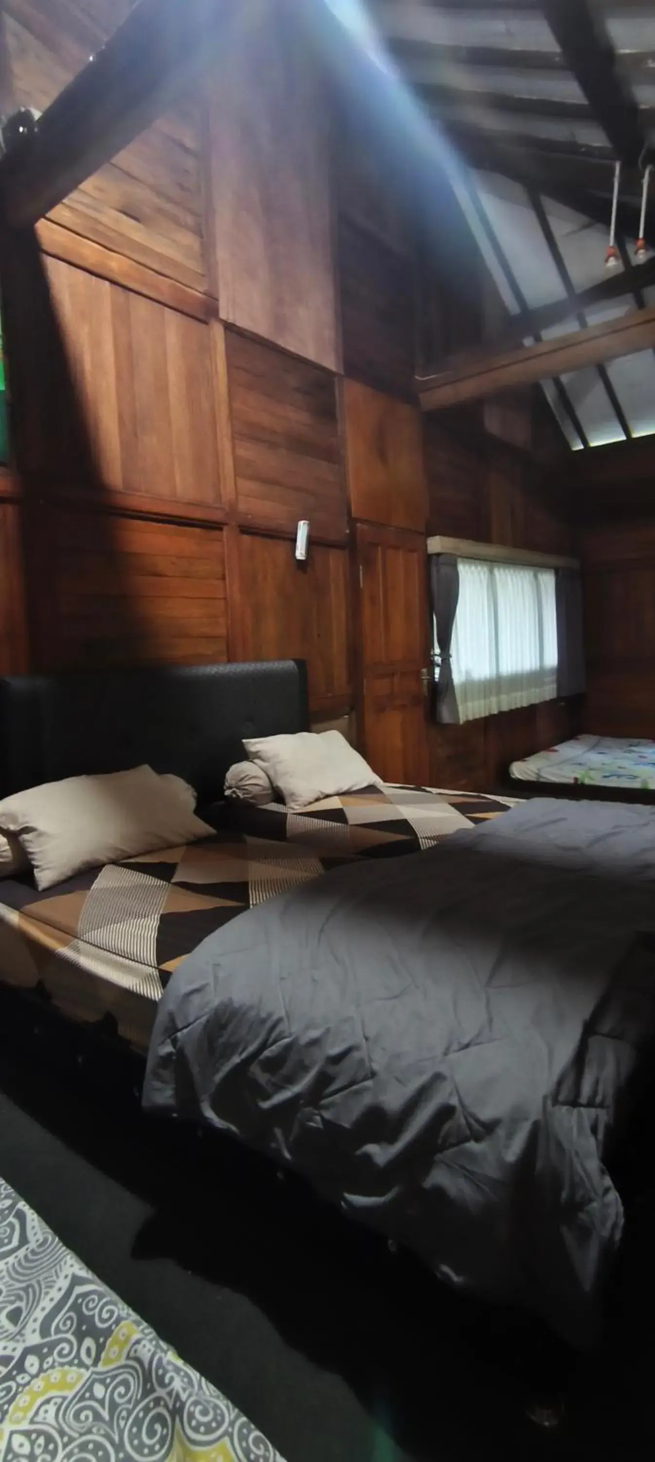 Bed in NK Villa Syariah And Cafe Prigen Bed in NK Villa Syariah And Cafe Prigen