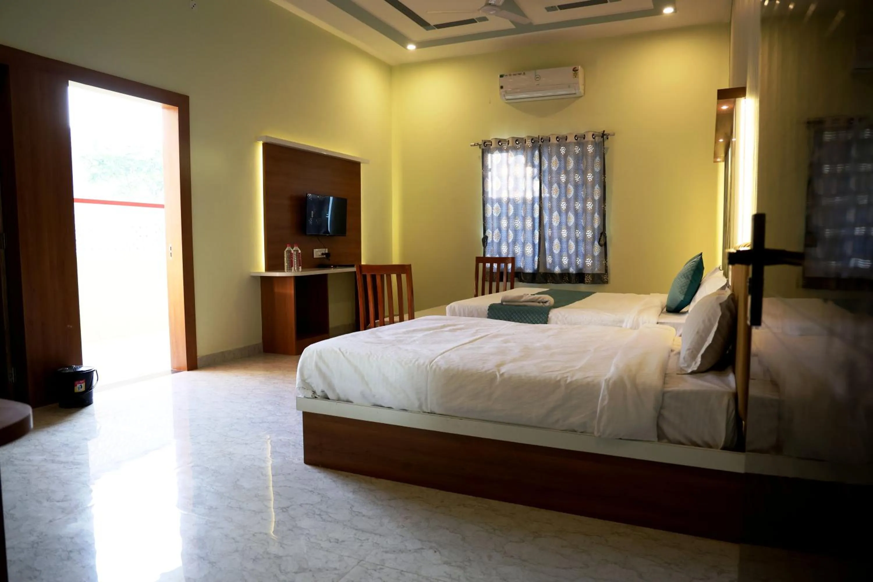 Bed in Savitri Valley Resort A Luxury Resort