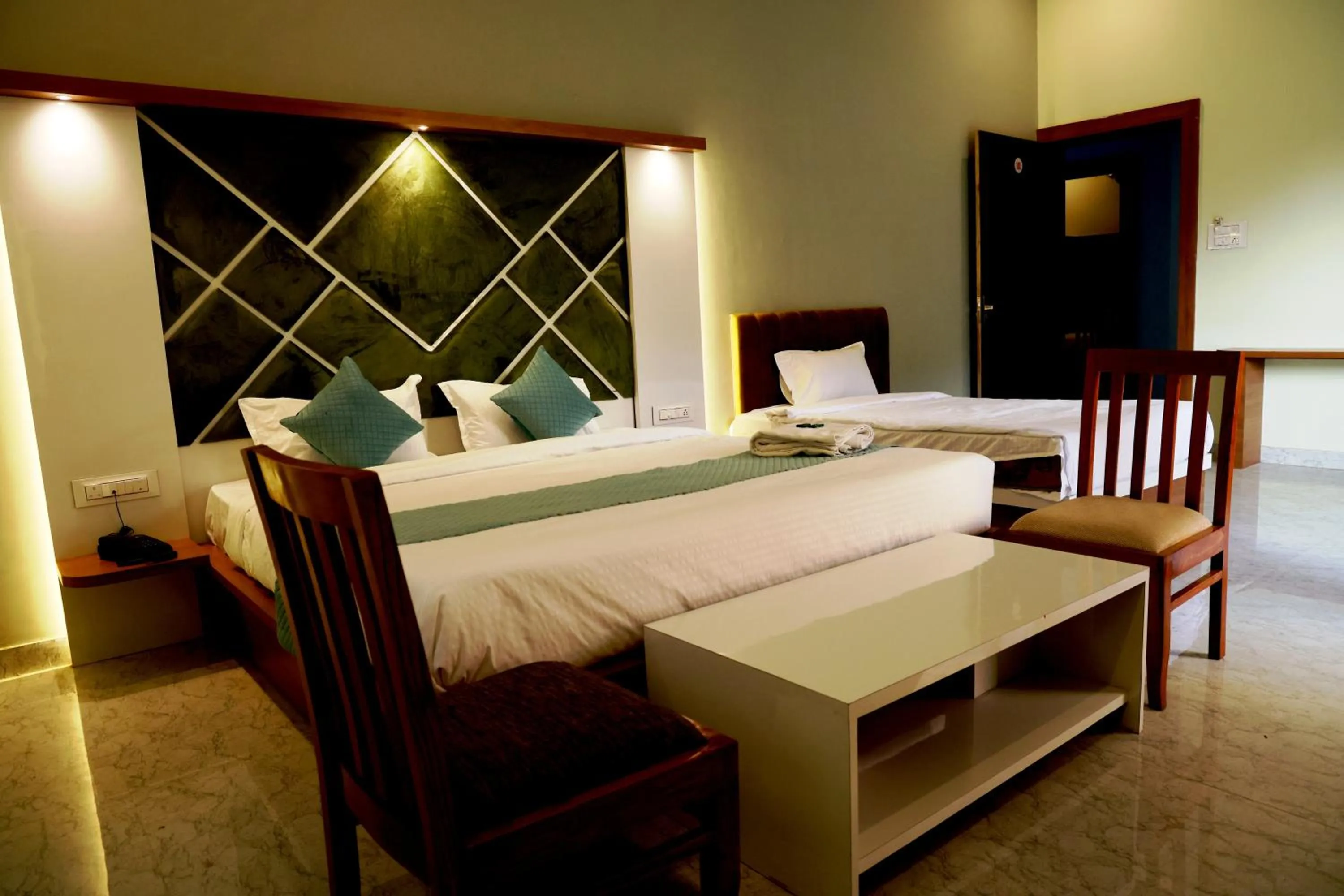 Bed in Savitri Valley Resort A Luxury Resort