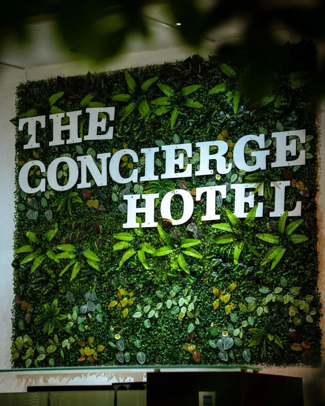 Property logo or sign in concierge hotel