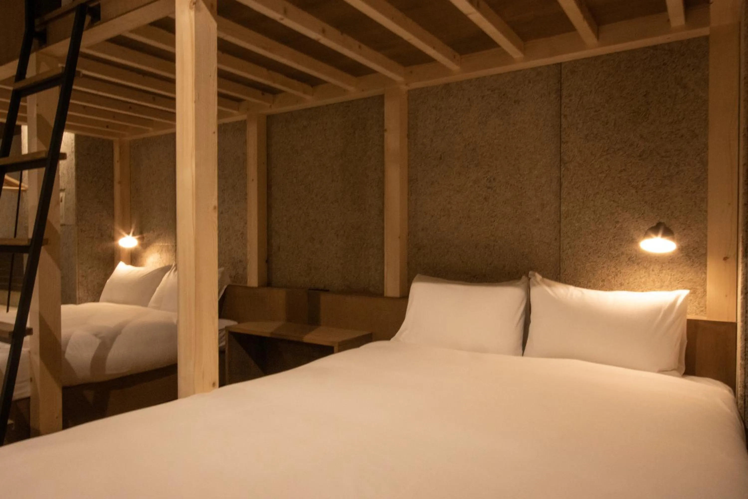 Bed in Green Room Hotel