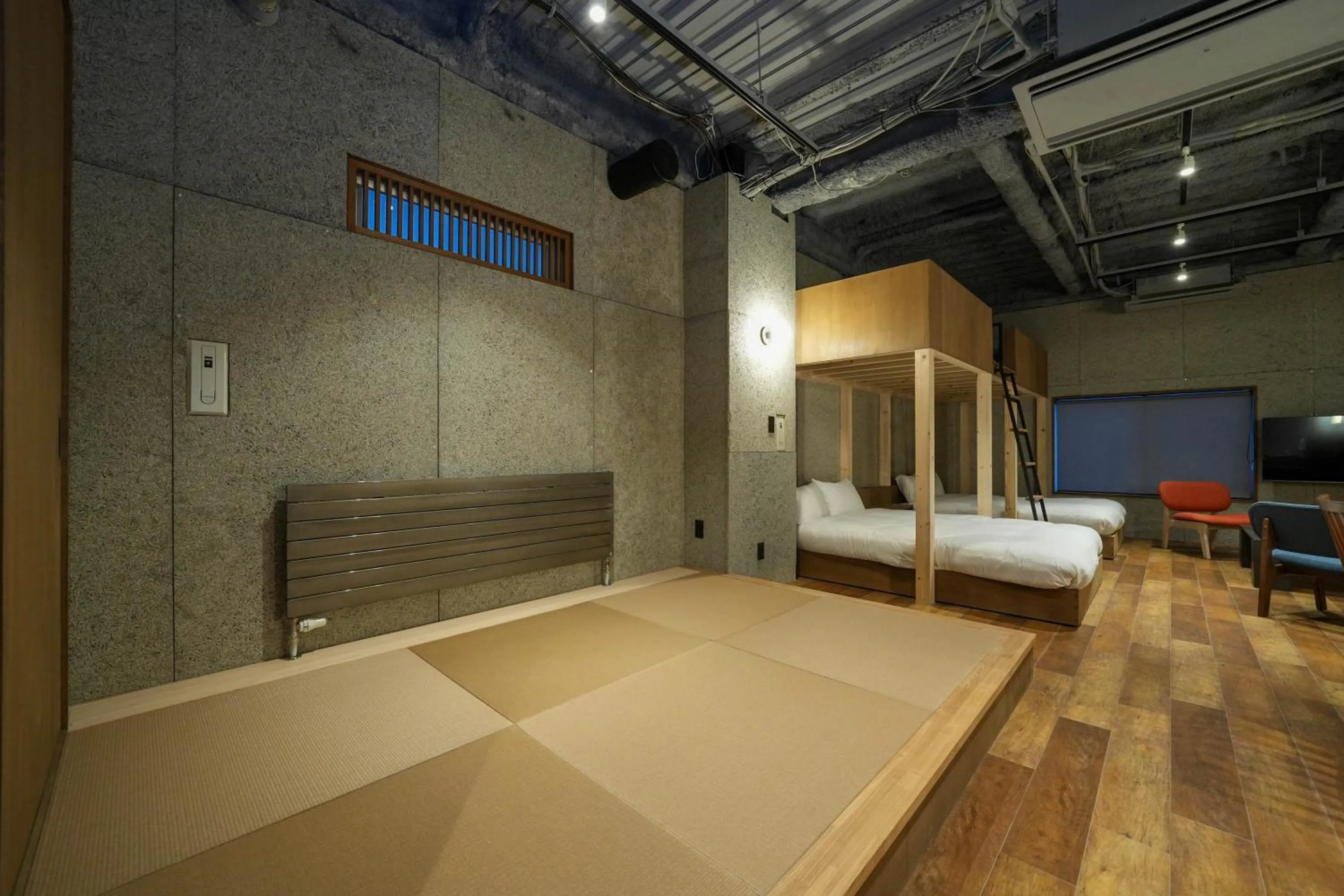 Bed in Green Room Hotel