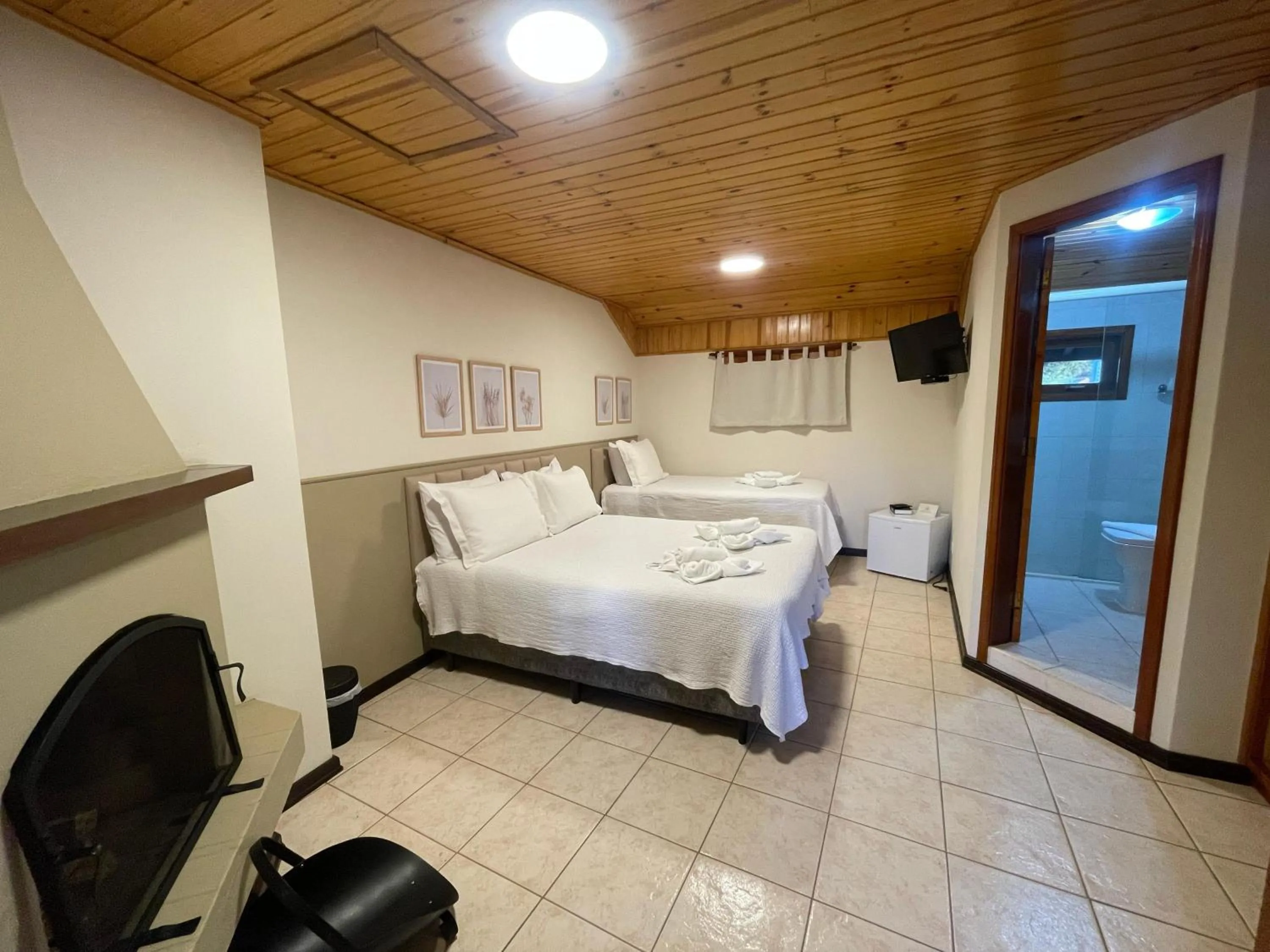 Bed in Pousada Flor de Lua Monte Verde