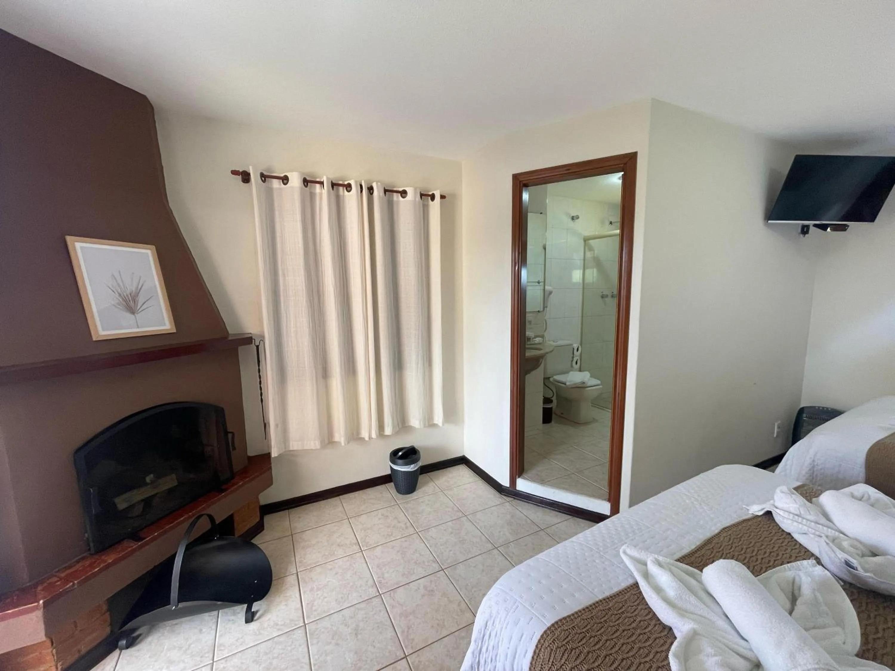 Bed in Pousada Flor de Lua Monte Verde