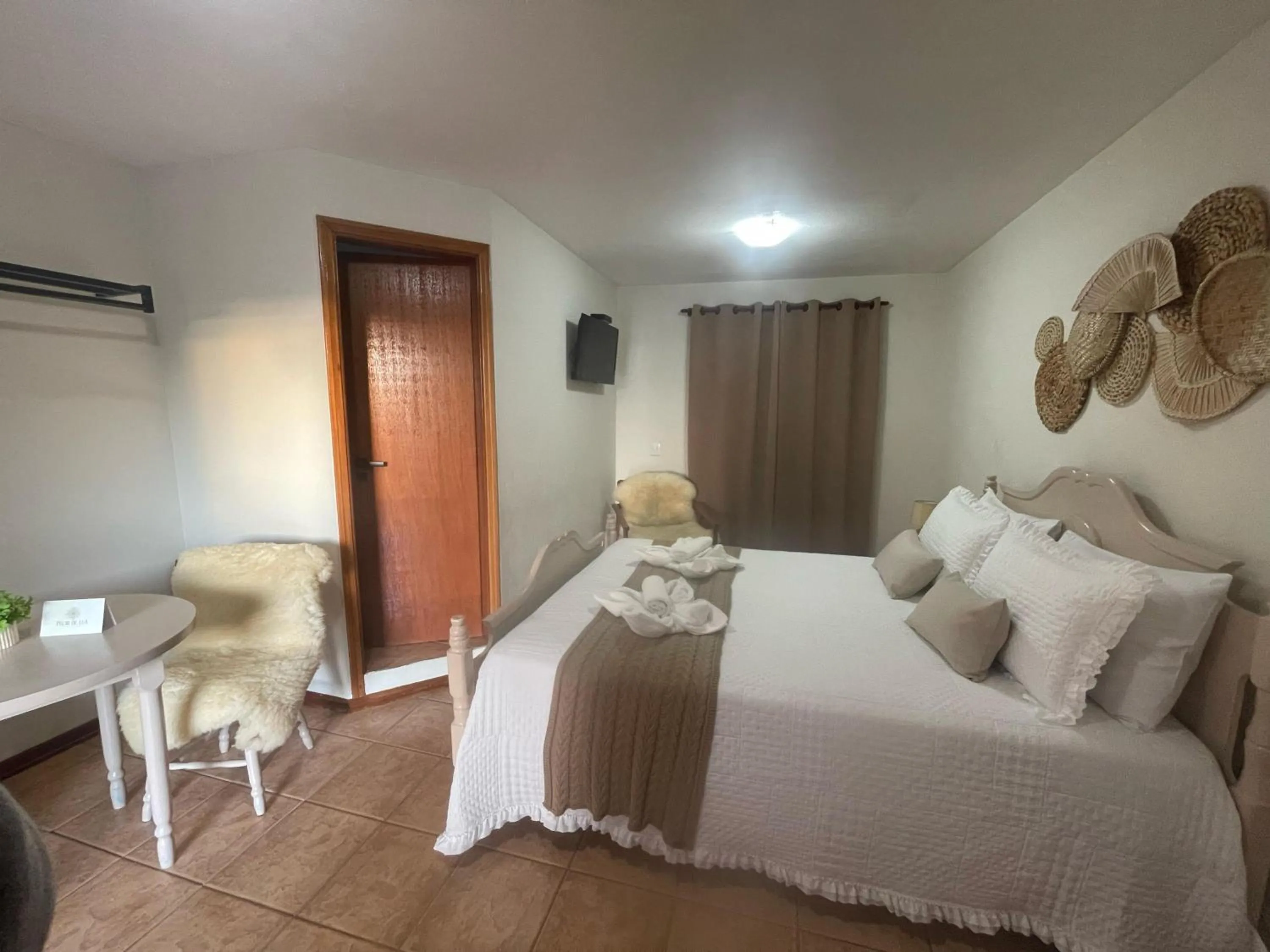 Bed in Pousada Flor de Lua Monte Verde