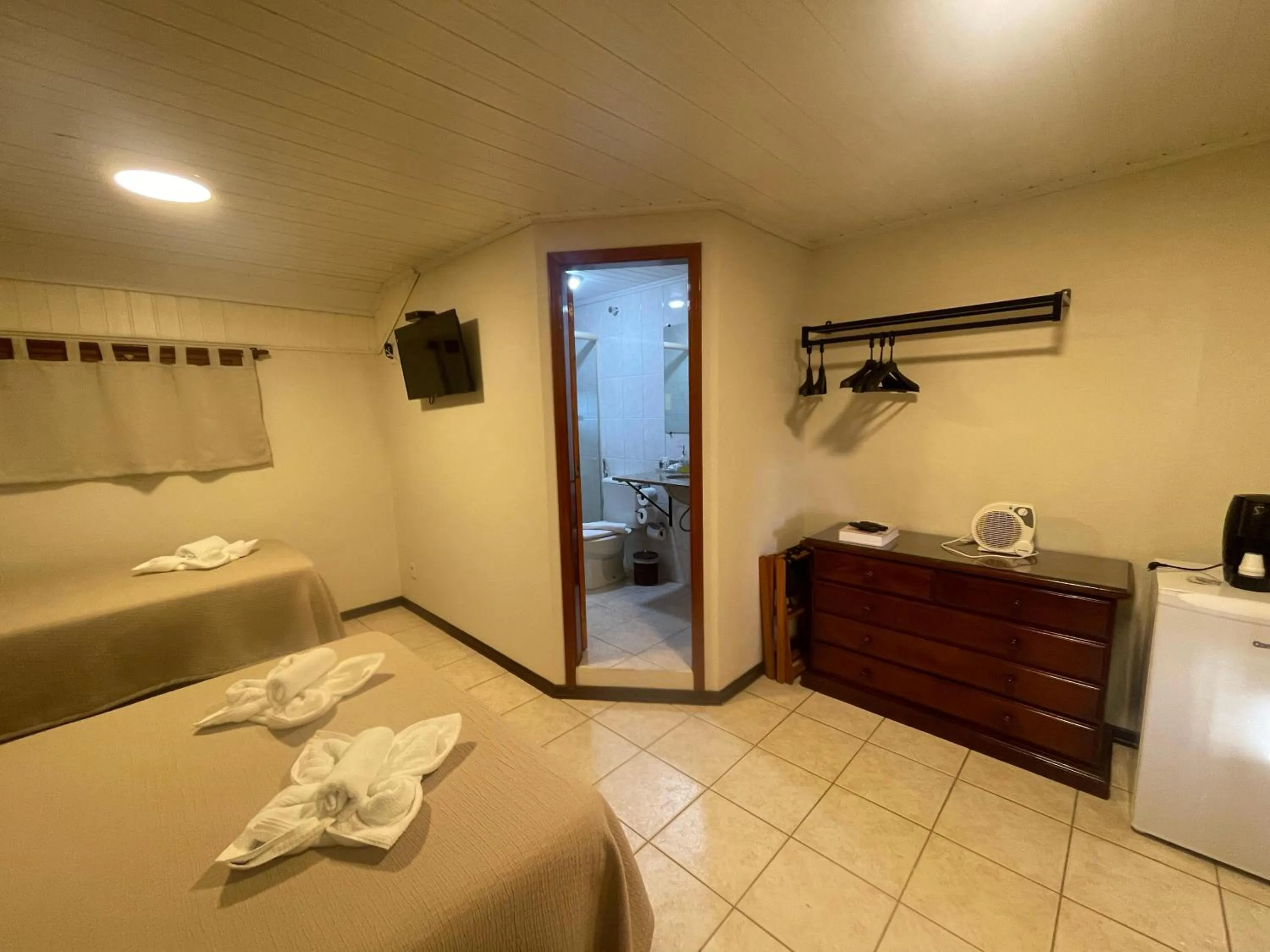 Bed in Pousada Flor de Lua Monte Verde