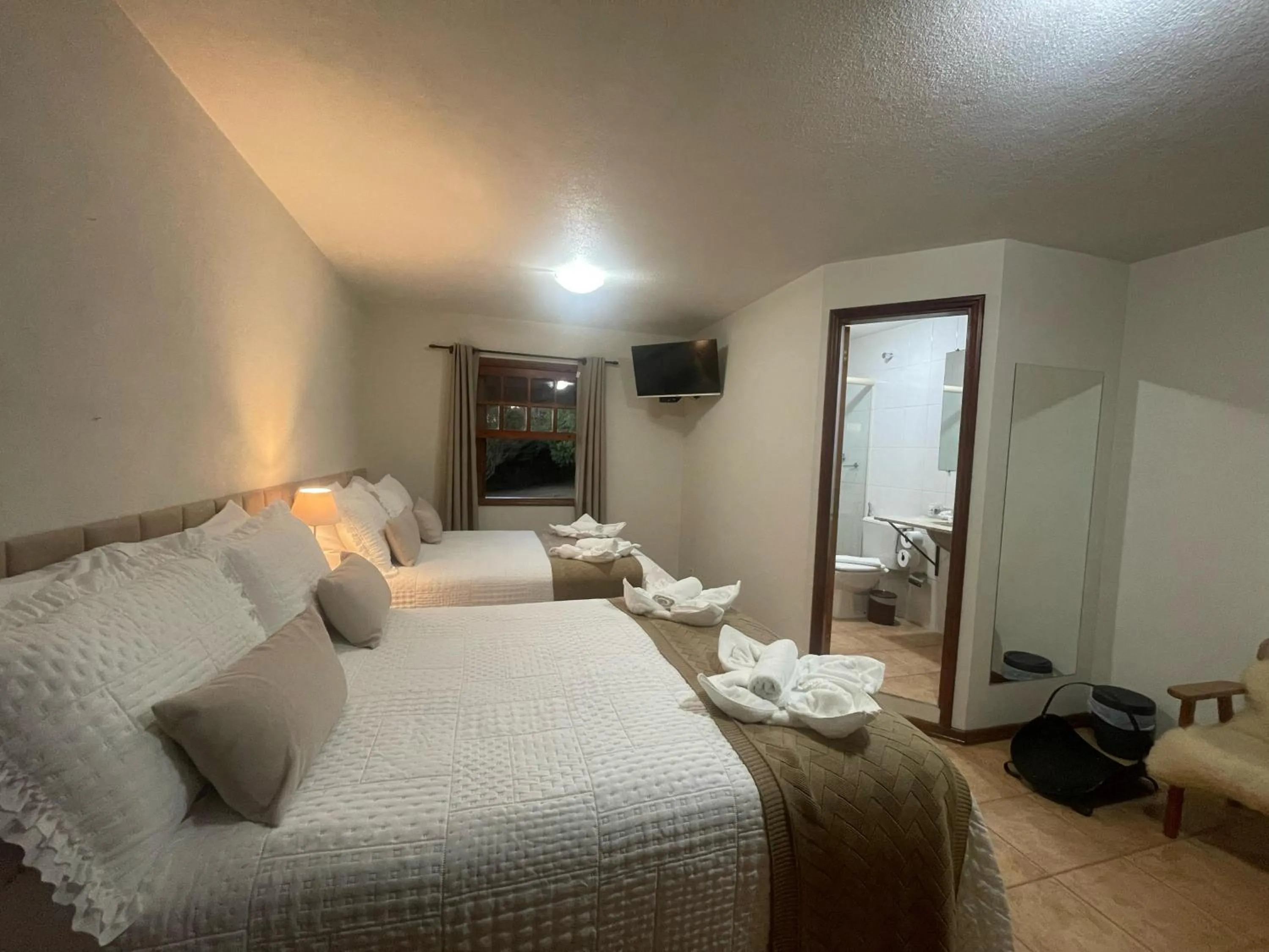 Bed in Pousada Flor de Lua Monte Verde