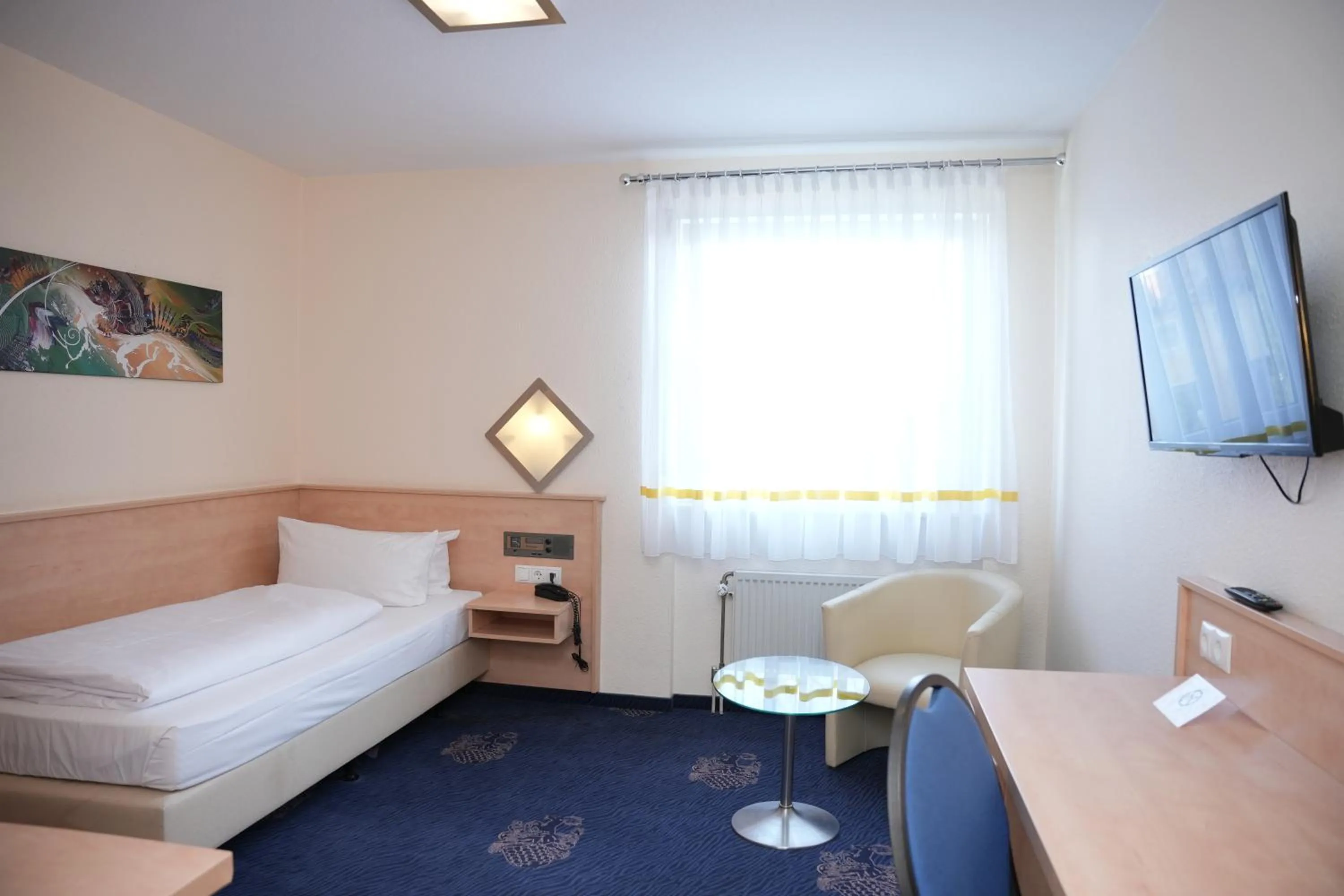 Bed in Weber Hotel Mannheim