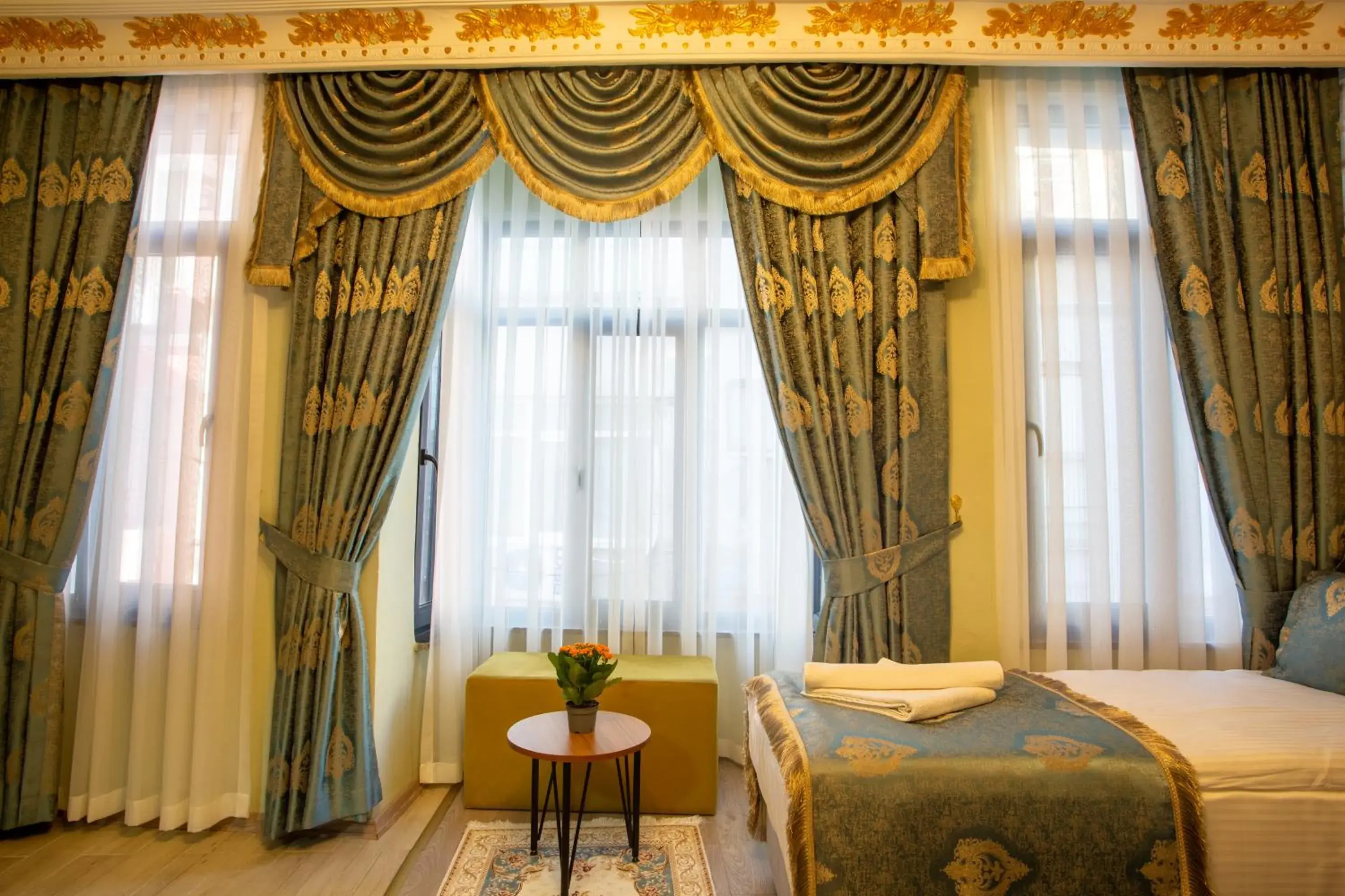 Bed in Sayina Hotel Bed in Sayina Hotel