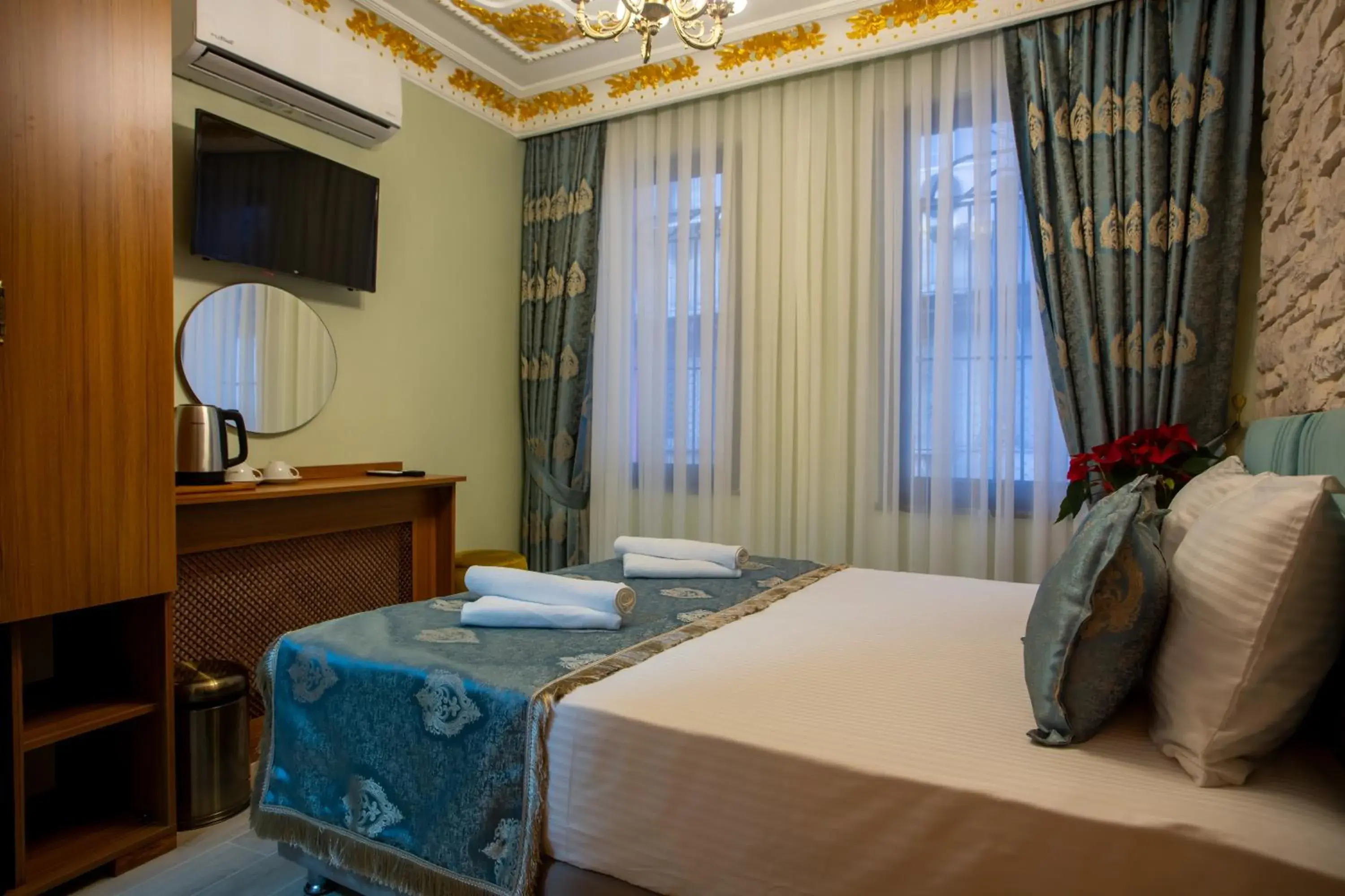 Bed in Sayina Hotel Bed in Sayina Hotel