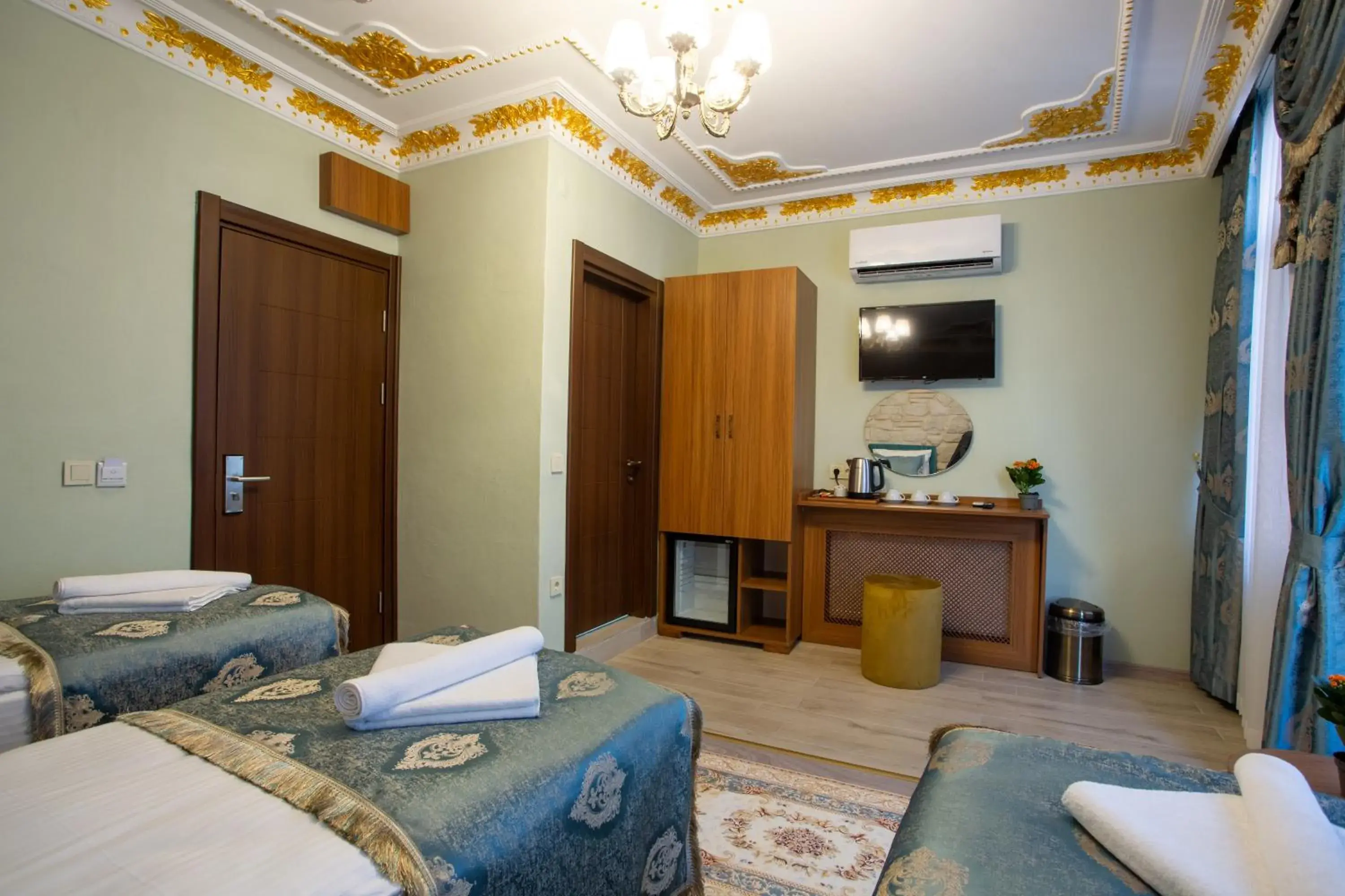 Bed in Sayina Hotel Bed in Sayina Hotel