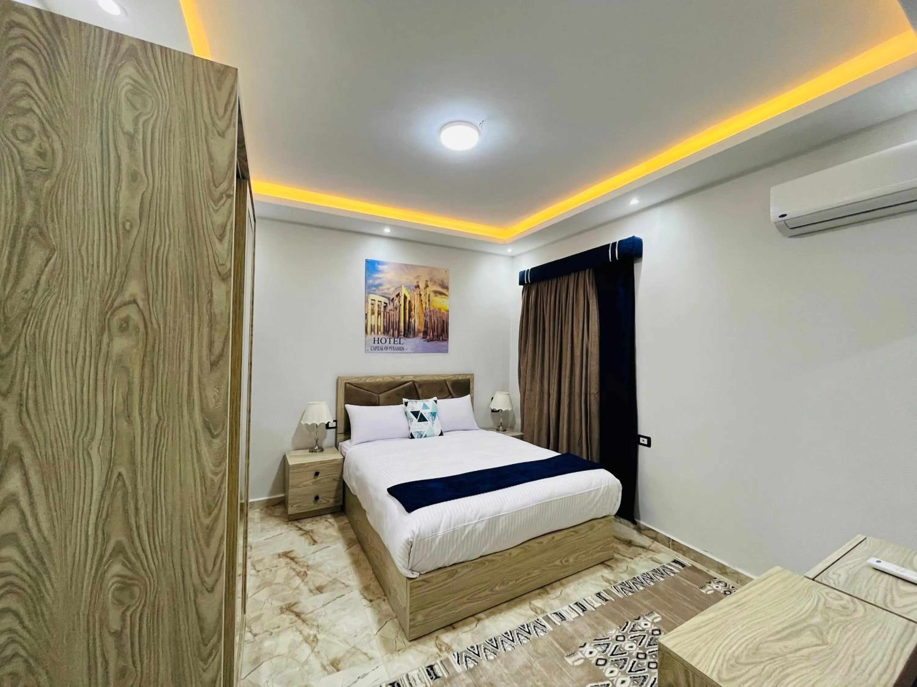 Photo of the whole room, Bed in Capital Of Pyramids Hotel