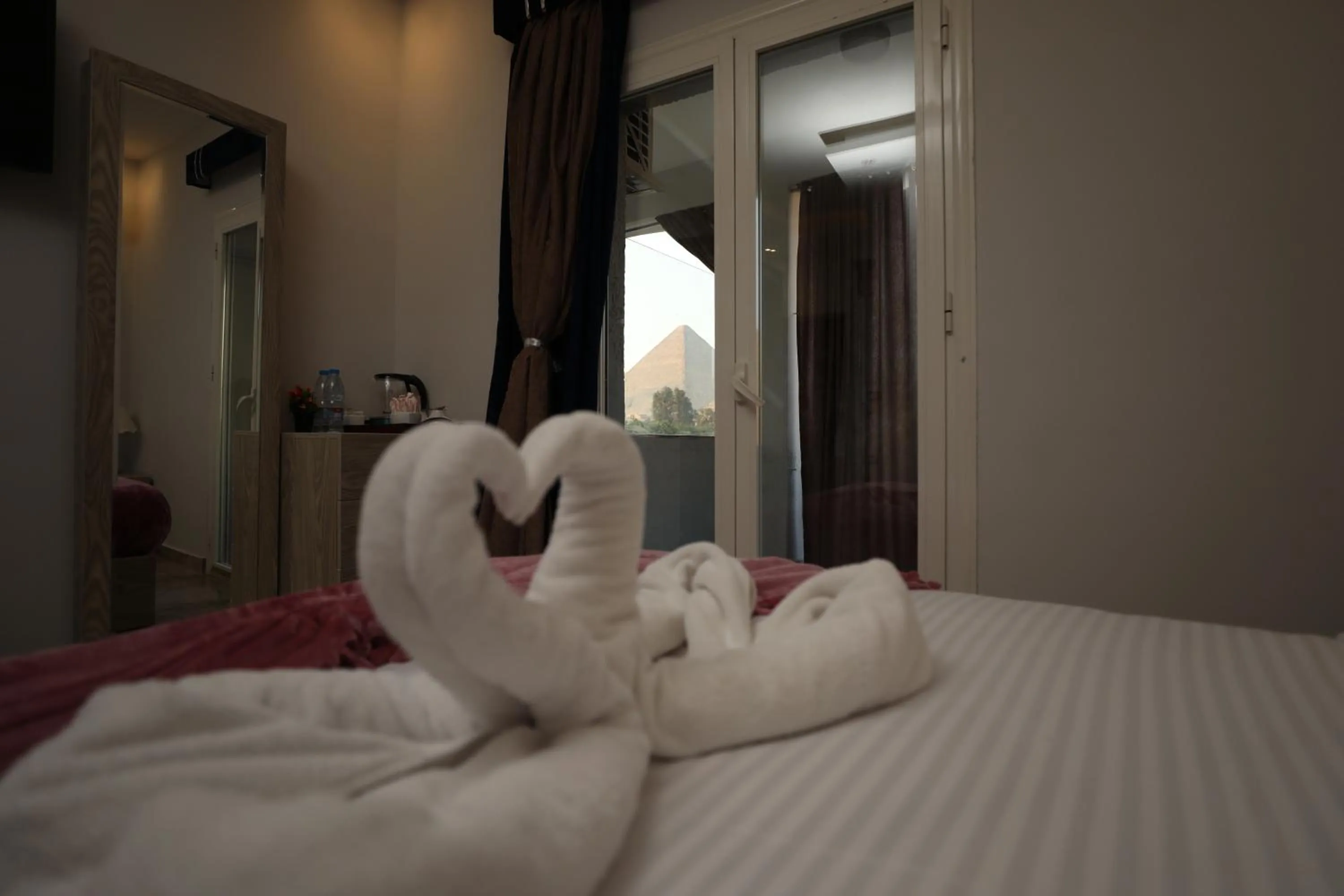 View (from property/room), Bed in Capital Of Pyramids Hotel