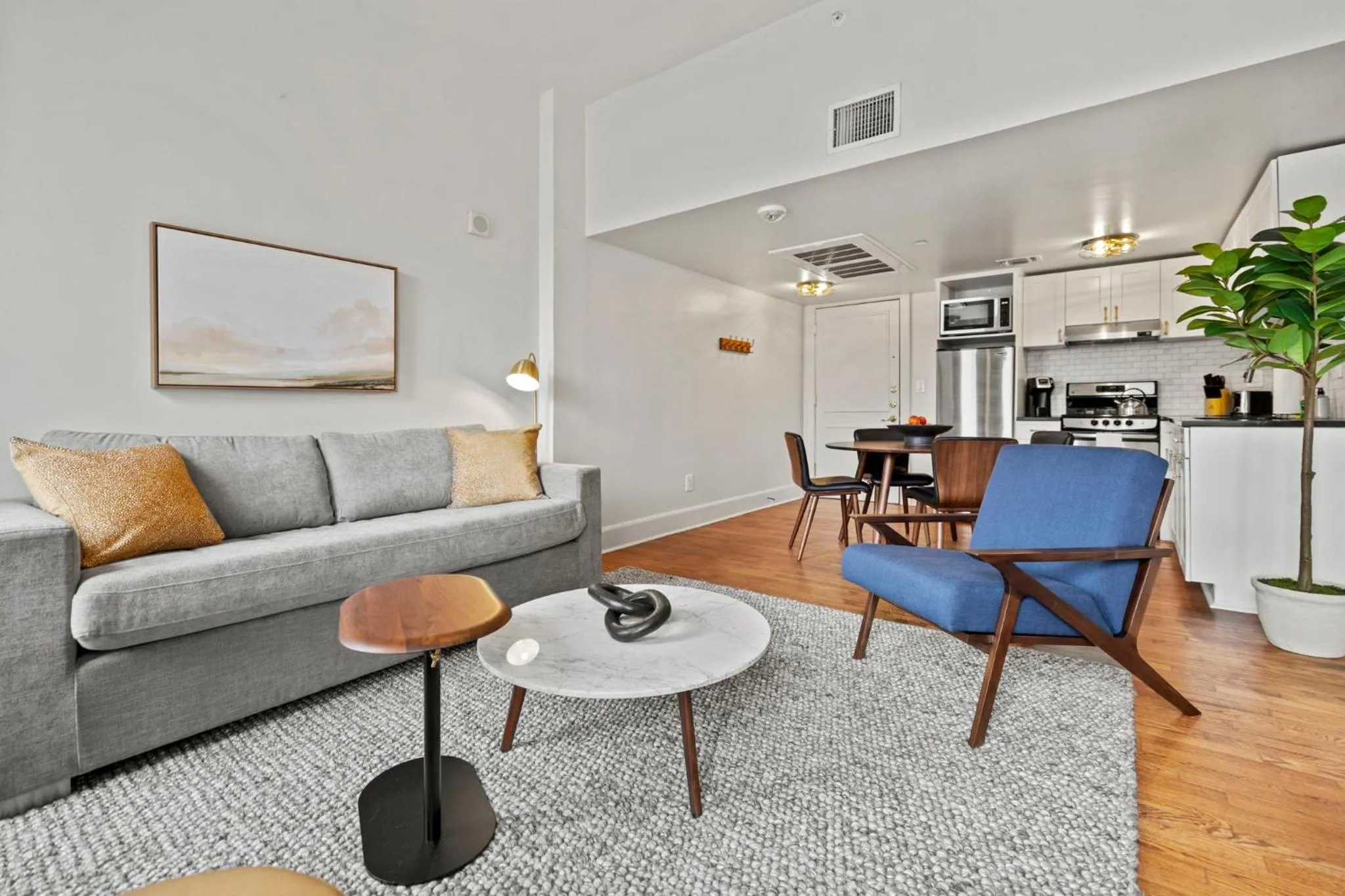 Living room in The Maverick, powered by Placemakr - River Walk