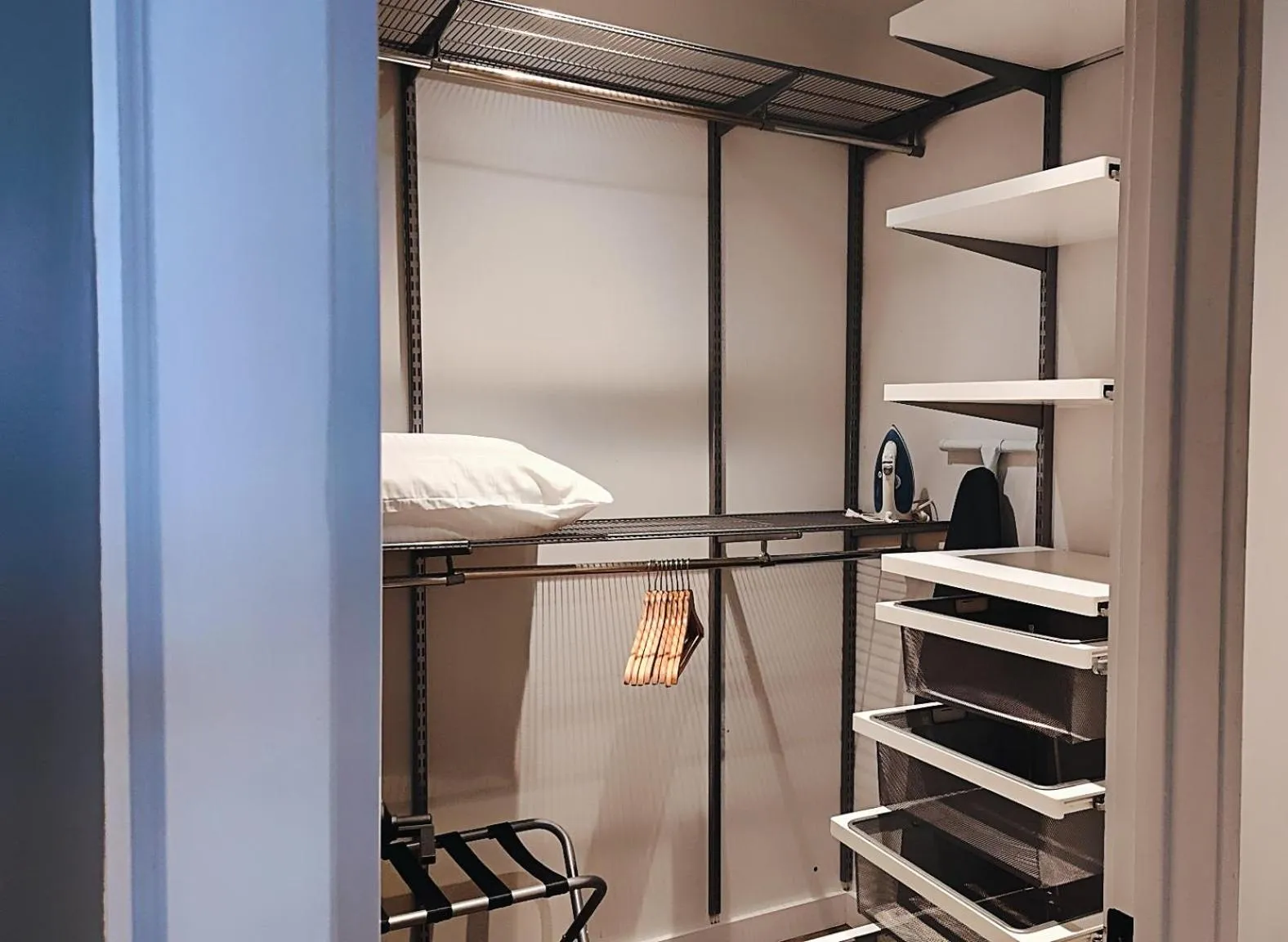 wardrobe, Bed in The Maverick, powered by Placemakr - River Walk