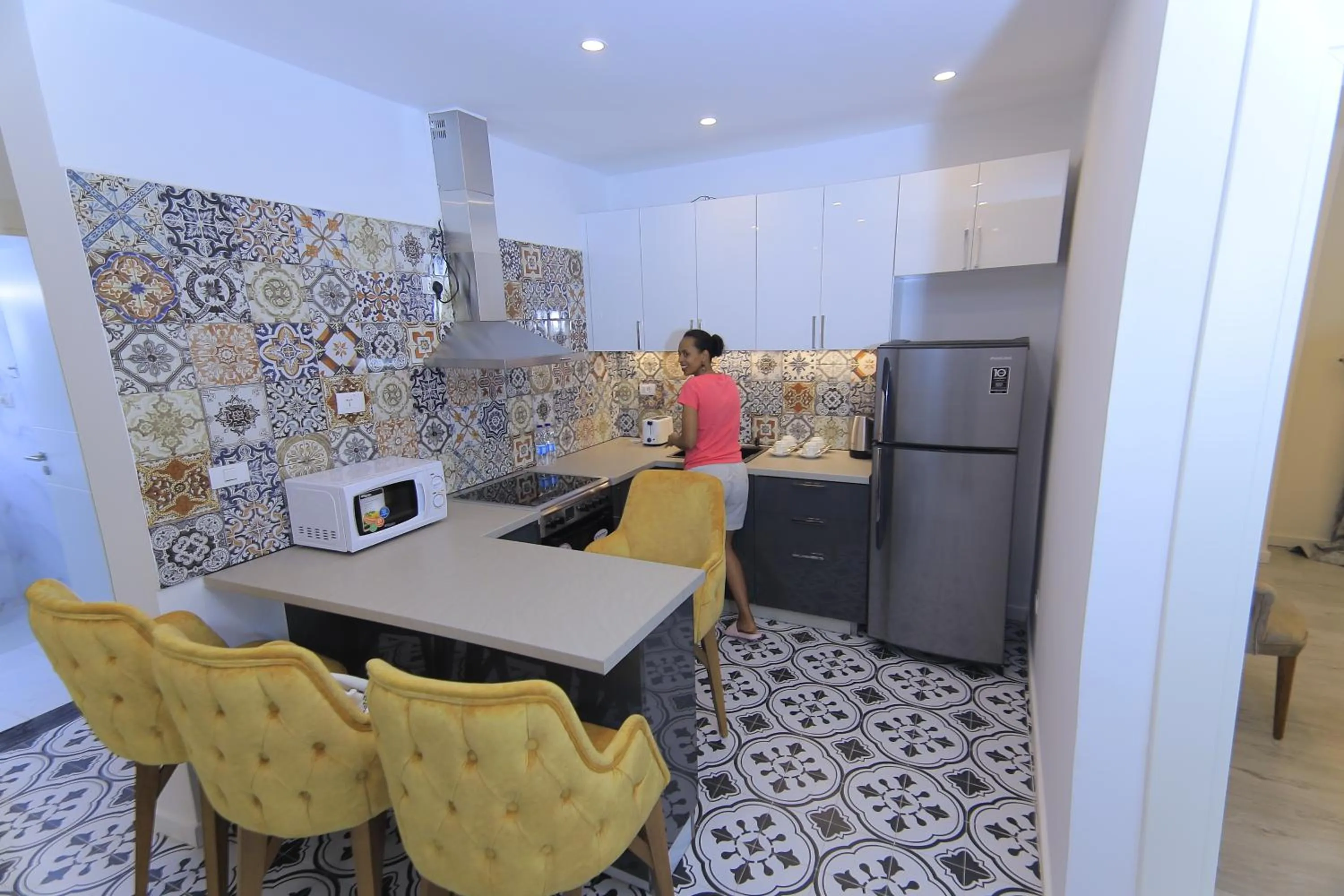 Kitchen or kitchenette in Zemilo Hotel Apartment