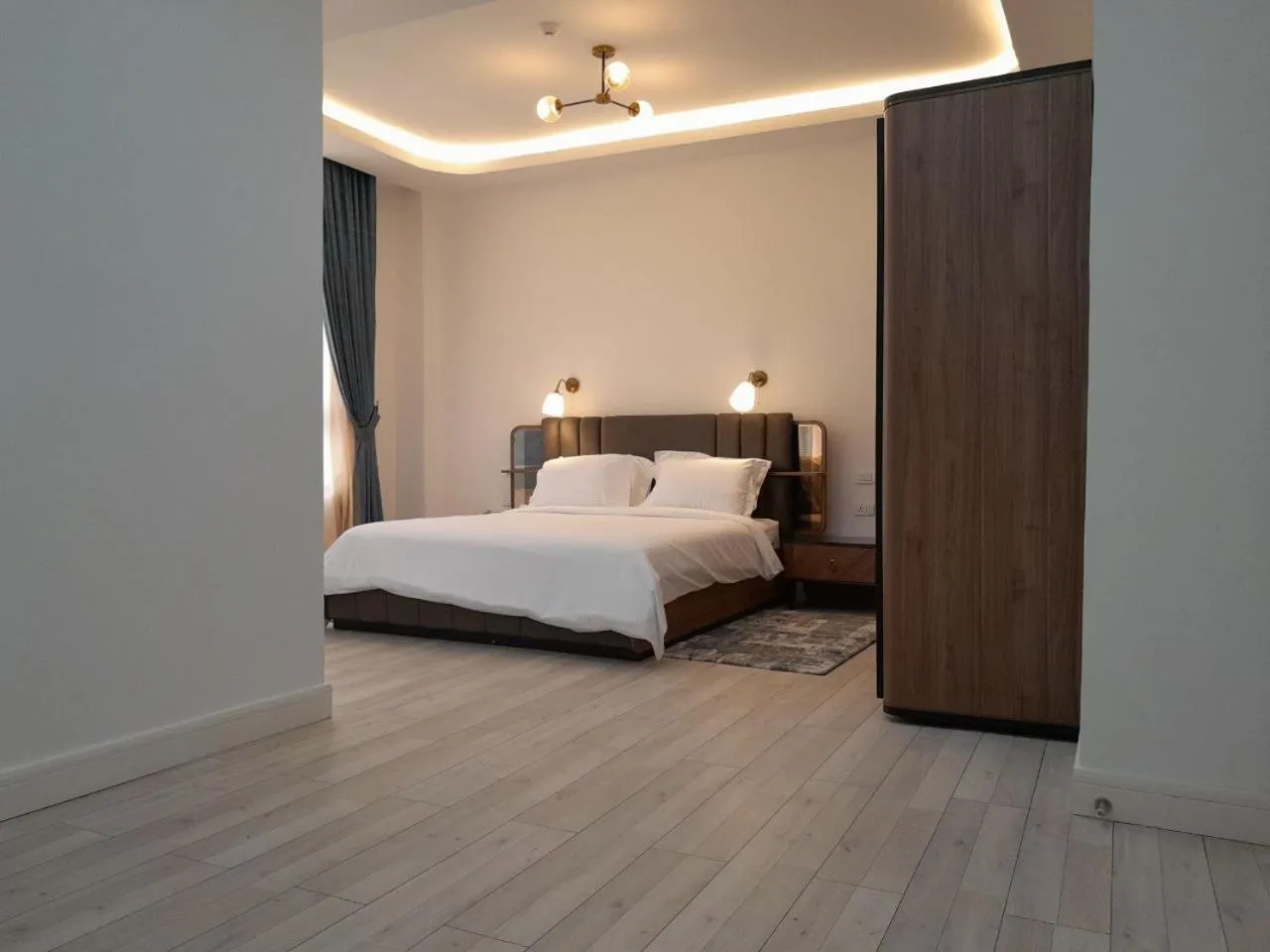 Bed in Zemilo Hotel Apartment